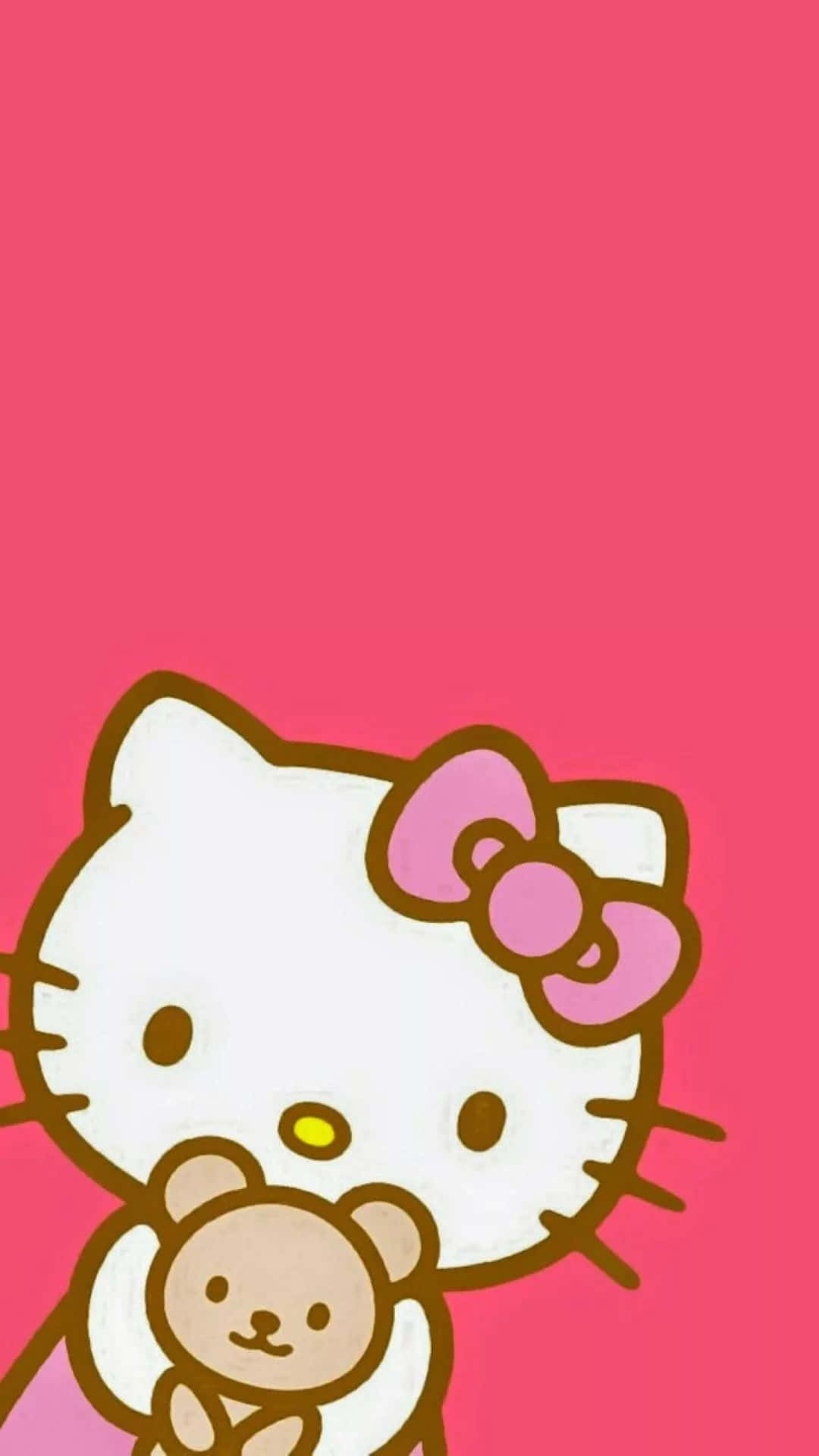 Sanrio Hello Kitty手機壁紙 壁紙 — Hello Kitty 在純粉紅色背景前抱著一隻泰迪熊，風格可愛卡通。