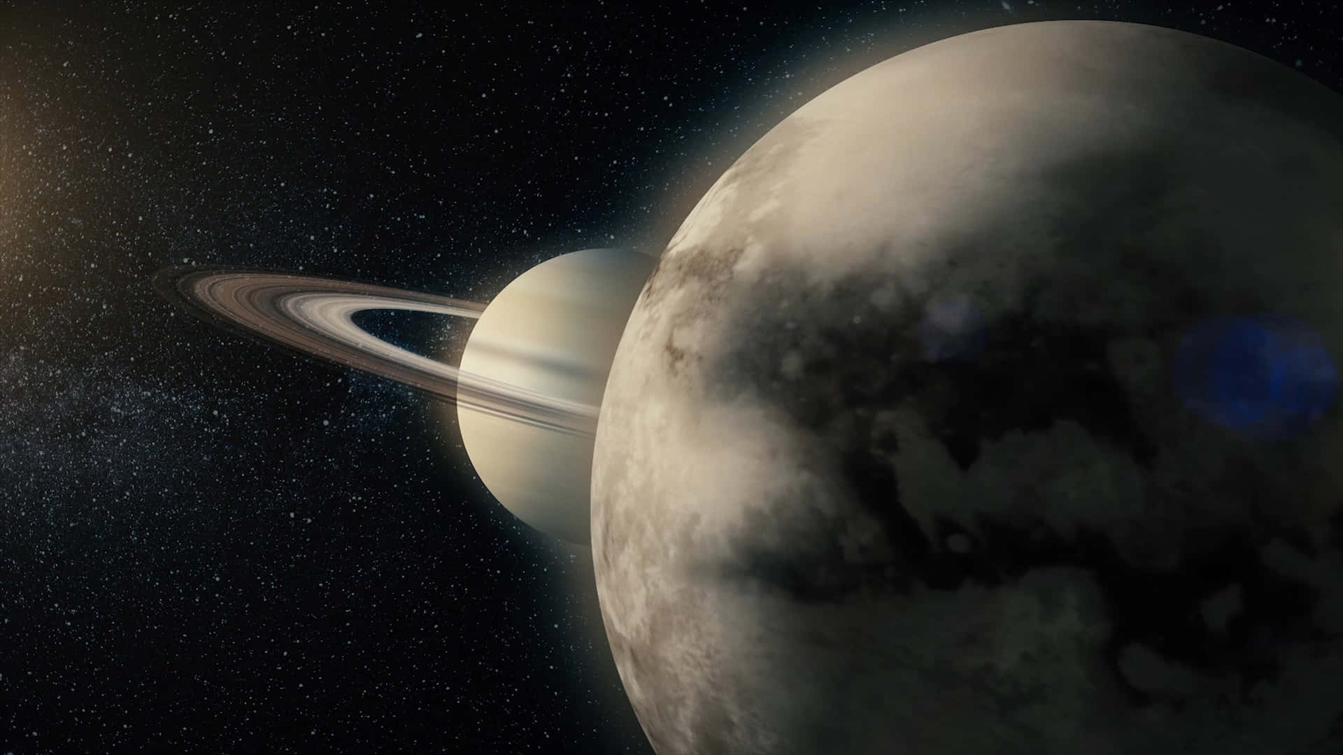 一顆環狀行星和衛星在繁星點點的夜空中閃耀。