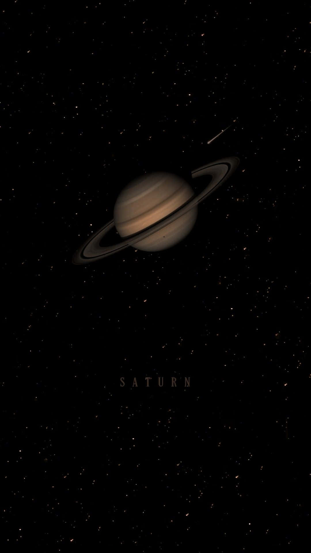  壁紙 — 土星以其標誌性的光環在星空下柔和發光，下方中央有「Saturn」字樣。