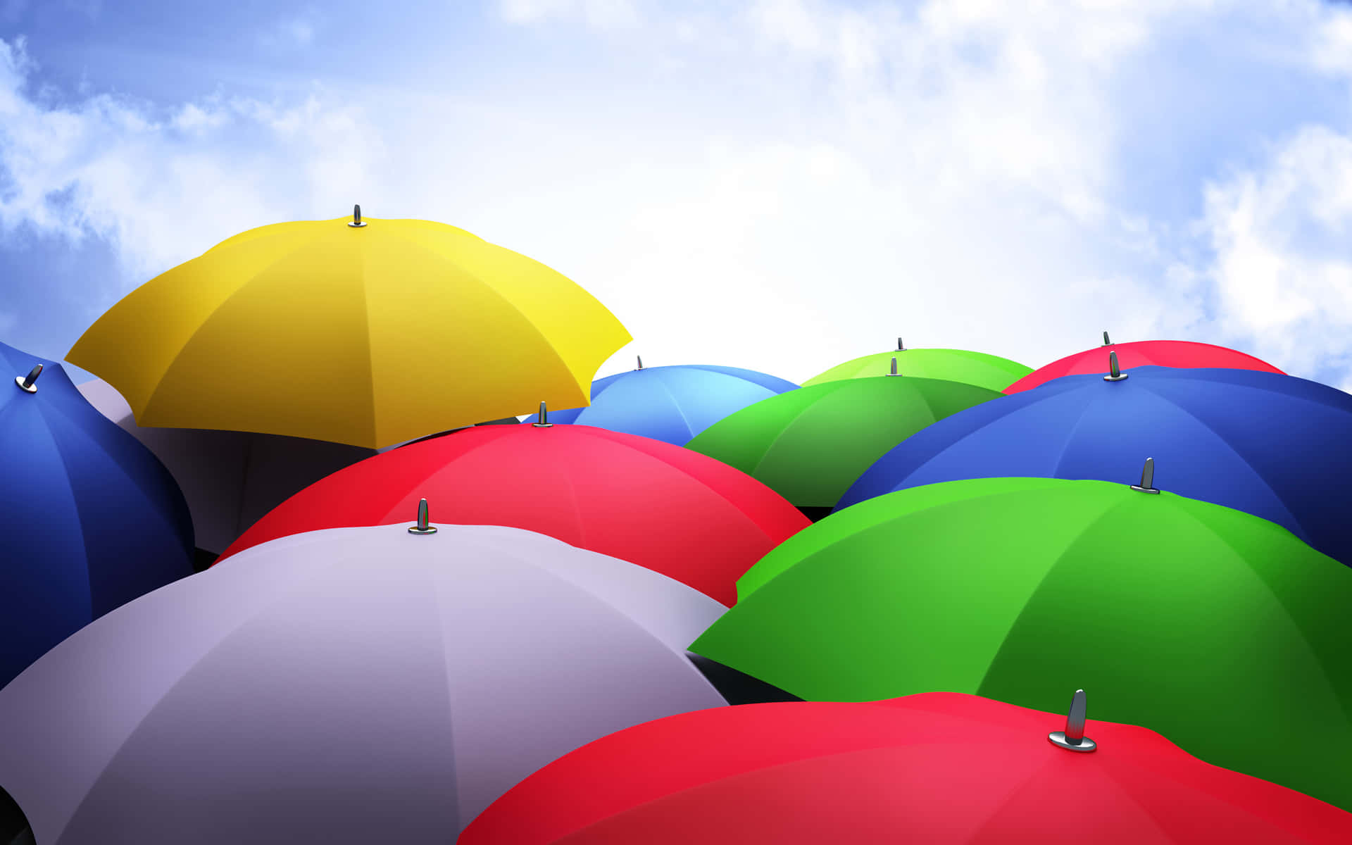  壁紙 — 色彩繽紛的雨傘在藍天白雲下聚集在一起。