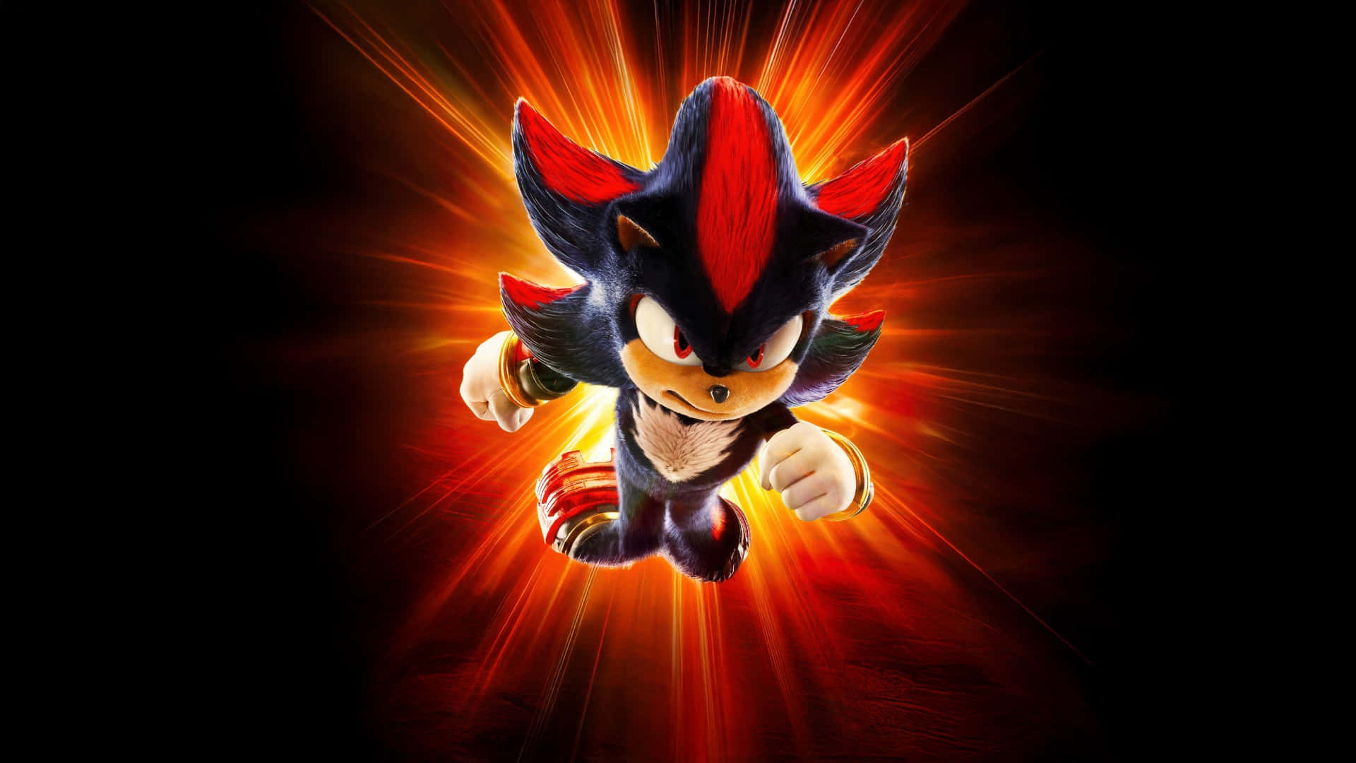  壁紙 — Shadow the Hedgehog 向前衝刺，身體散發出發光的紅色和橙色能量光束，背景為黑色。