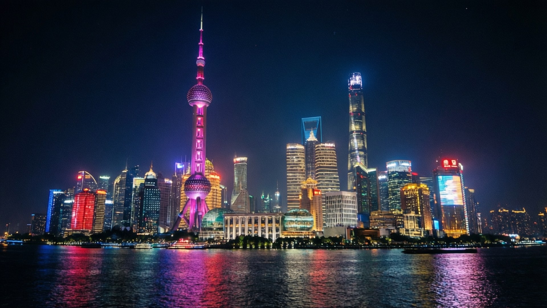 夜晚的上海天際線，燈火通明的摩天大樓和倒映在河中的東方明珠塔。