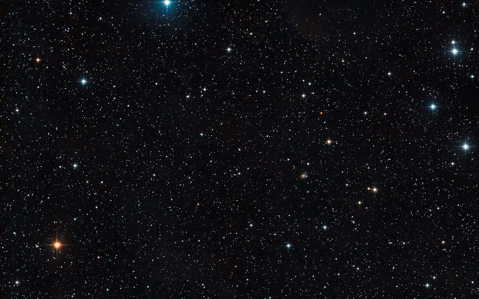 繁星點點的夜空，明亮與暗淡的星星散落在黑暗的虛空中。