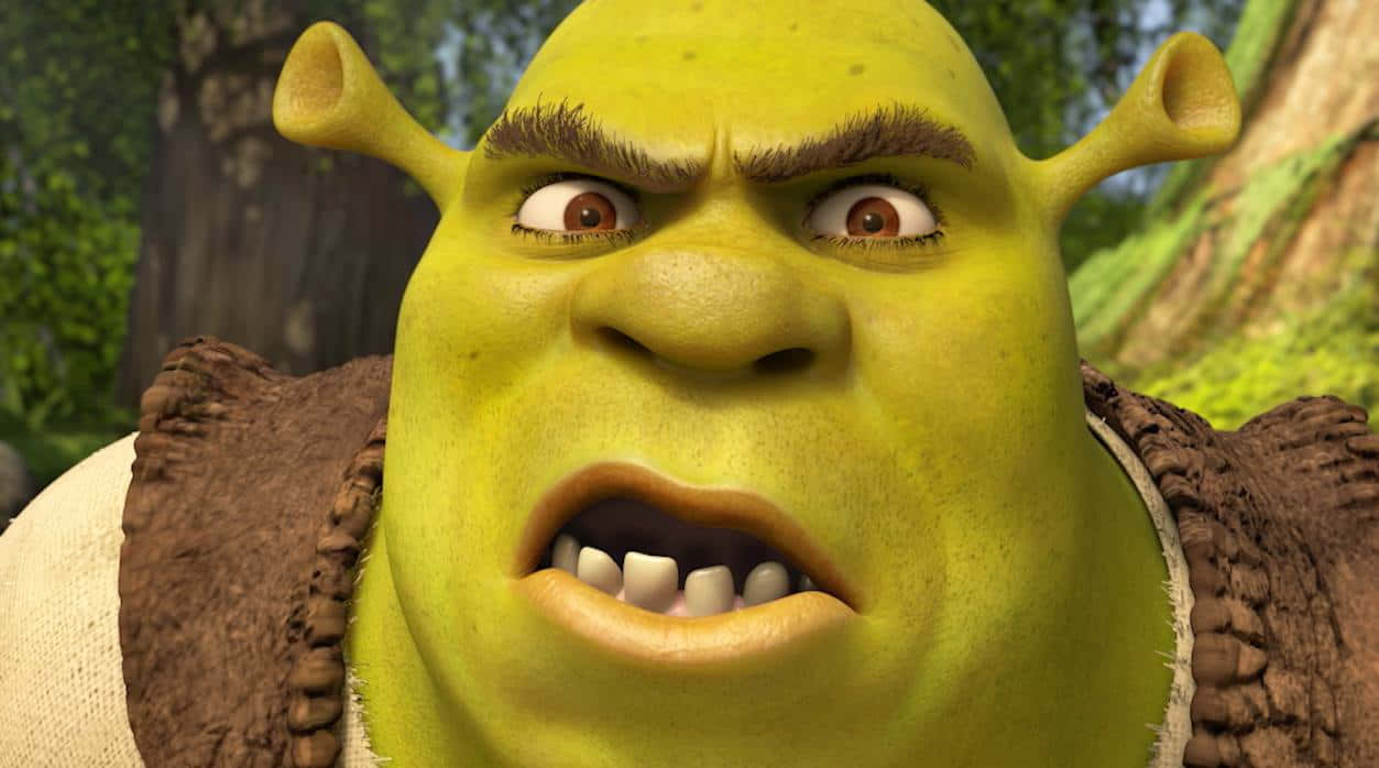 Shrek 的搞笑瞬間會讓你笑到肚子痛！ 壁紙 — 史力加在森林中憤怒表情的特寫。