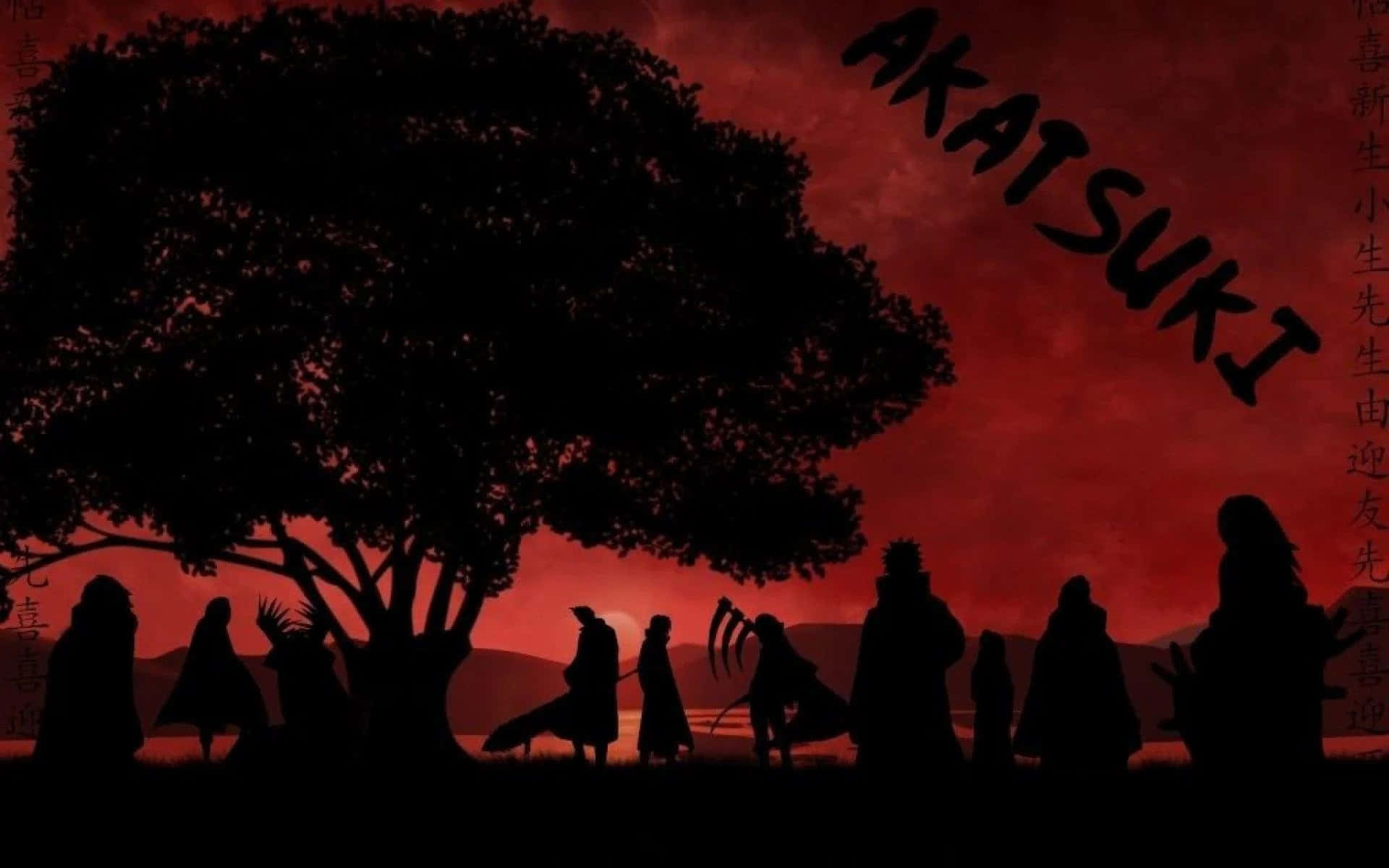 夜晚樹下曉組織忍者剪影，天空呈紅色。