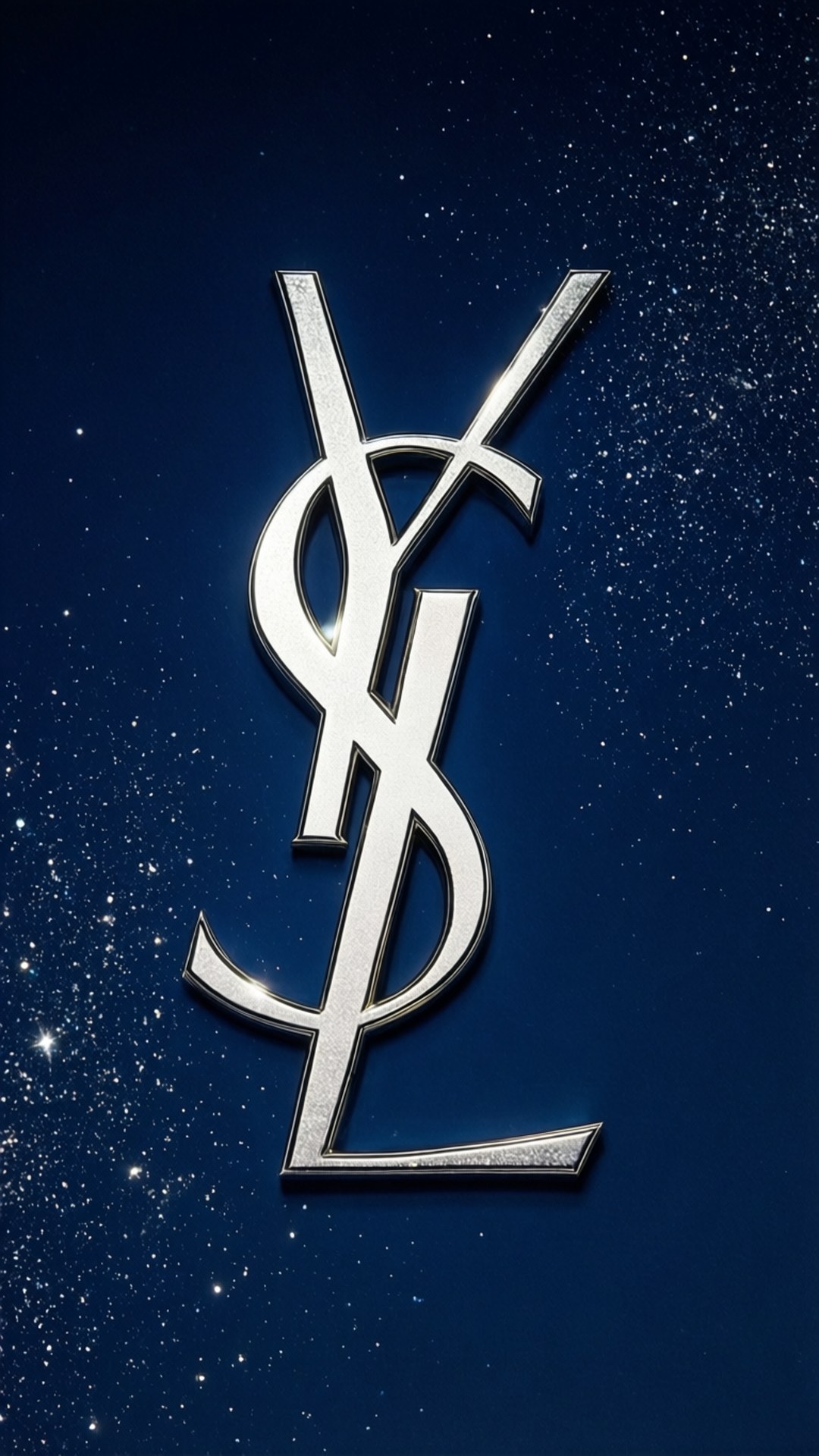 Silver YSL Starry Night 壁紙 — 閃亮的銀色YSL標誌漂浮在深藍色星空背景上，帶有閃爍的粒子。