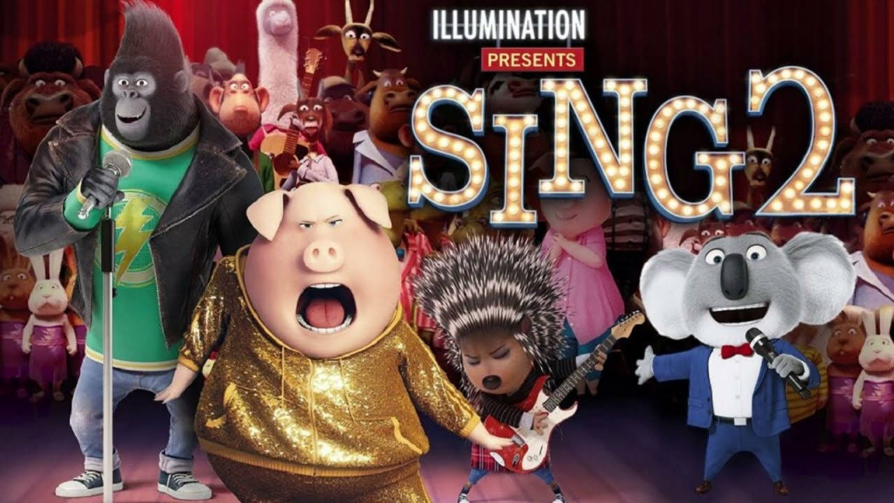 《Sing 2》角色演出 壁紙 — 動畫動物角色在帳篷標誌下，於燈光明亮及有樂器的舞台上表演。