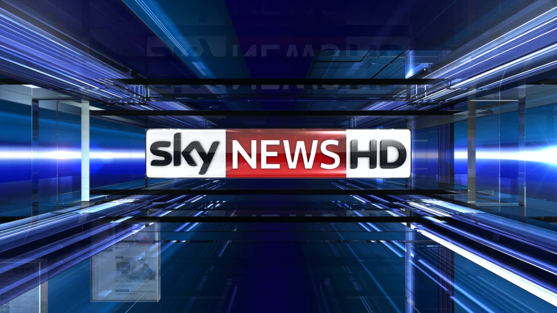 Sky News HD 藍光標誌 壁紙 — 一個未來感的新聞工作室，帶有發光的藍色燈光，以及一個在時尚數碼走廊中央突出的Sky News HD標誌。