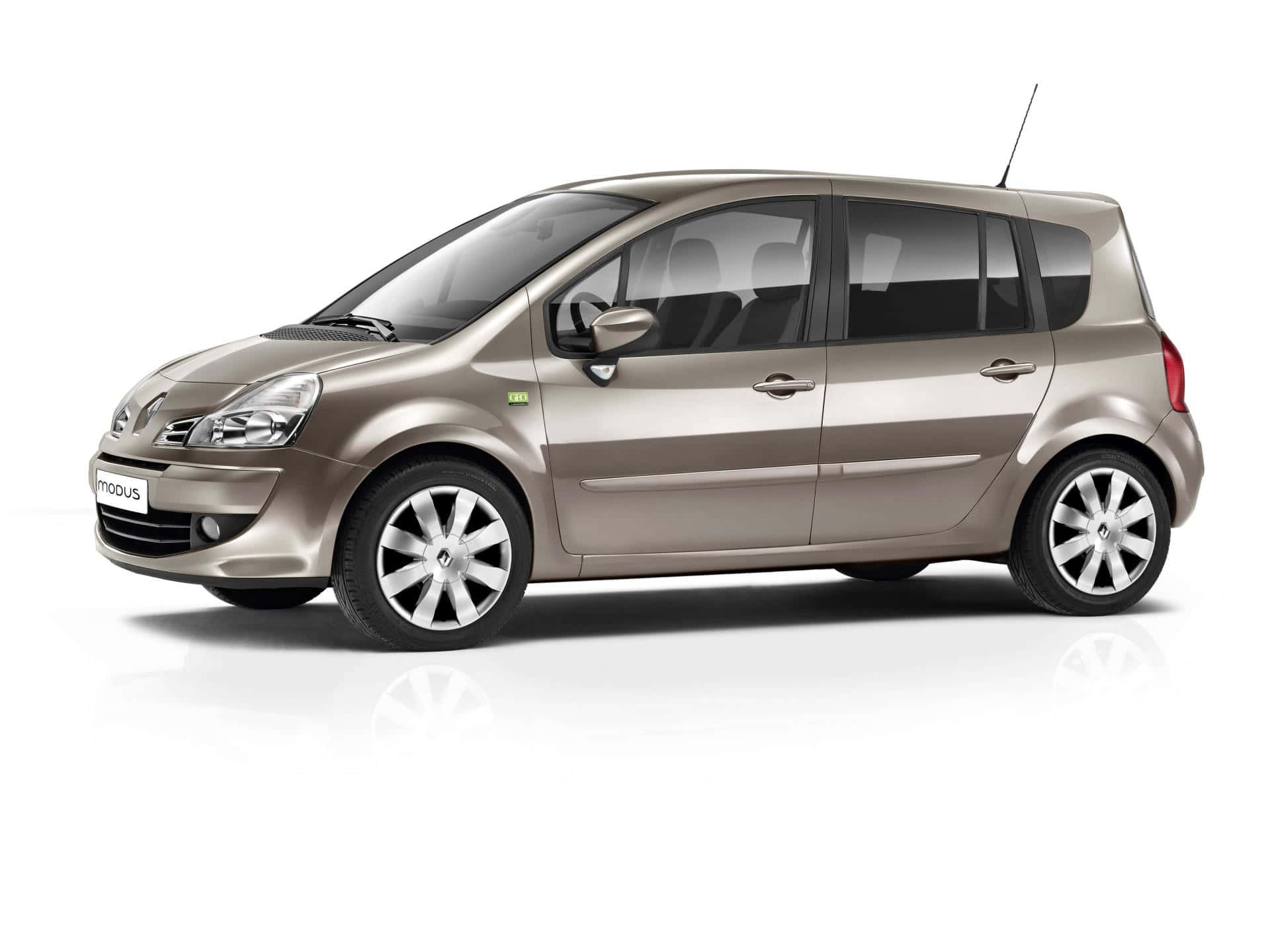 Renault Modus 桌布 壁紙 — 時尚的米色雷諾Modus緊湊型MPV在工作室燈光下展示，地板反射。