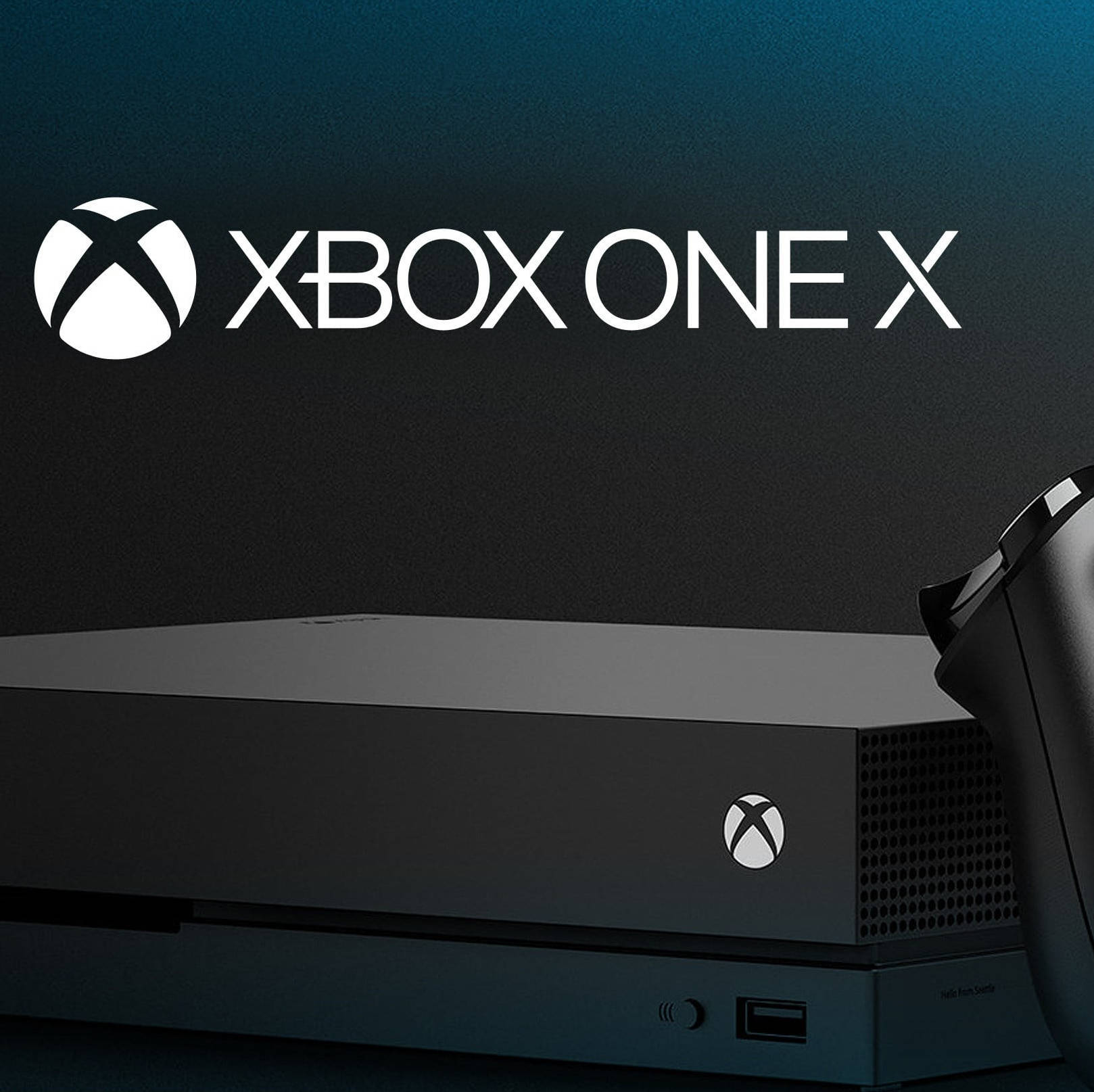 黑色 Xbox One X 主機連控制器，在深色背景上帶有發光標誌。