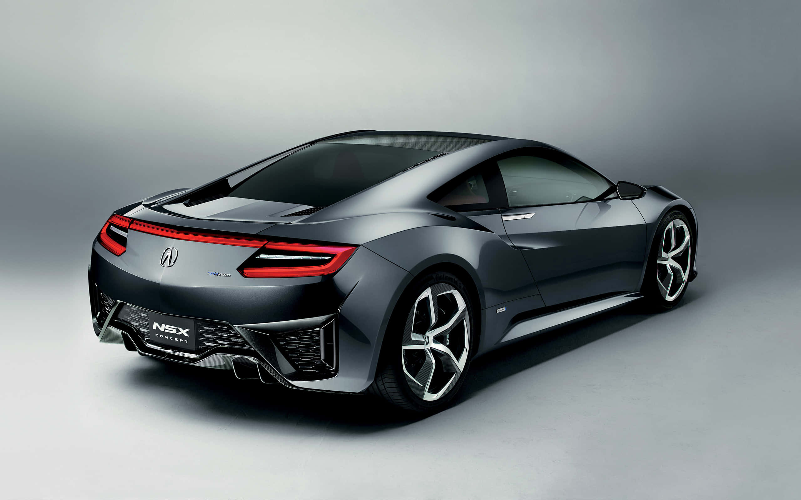 Acura Nsx 桌布 壁紙 — 一輛時尚的深灰色Acura NSX概念跑車，帶有發光的紅色尾燈，在簡約的攝影棚環境中展示。