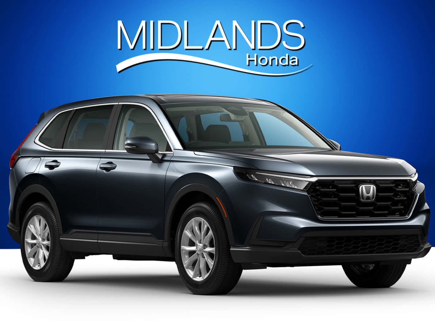 Honda Cr-v 桌布 壁紙 — 一輛時尚的深灰色本田SUV，在充滿活力的藍色漸變背景上展示，帶有「Midlands Honda」品牌標誌。