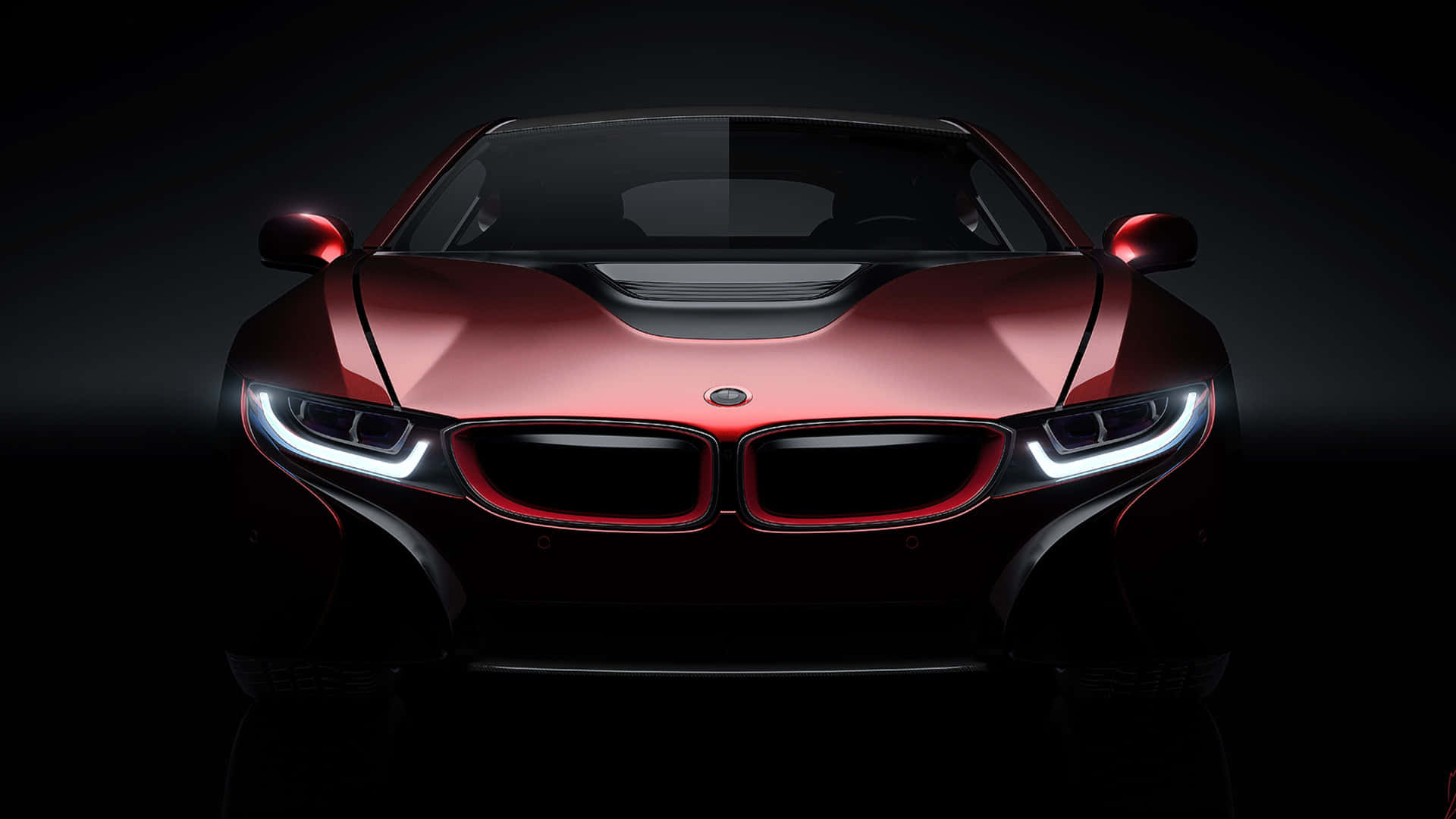 紅色BMW跑車在黑暗攝影棚中車頭燈發光