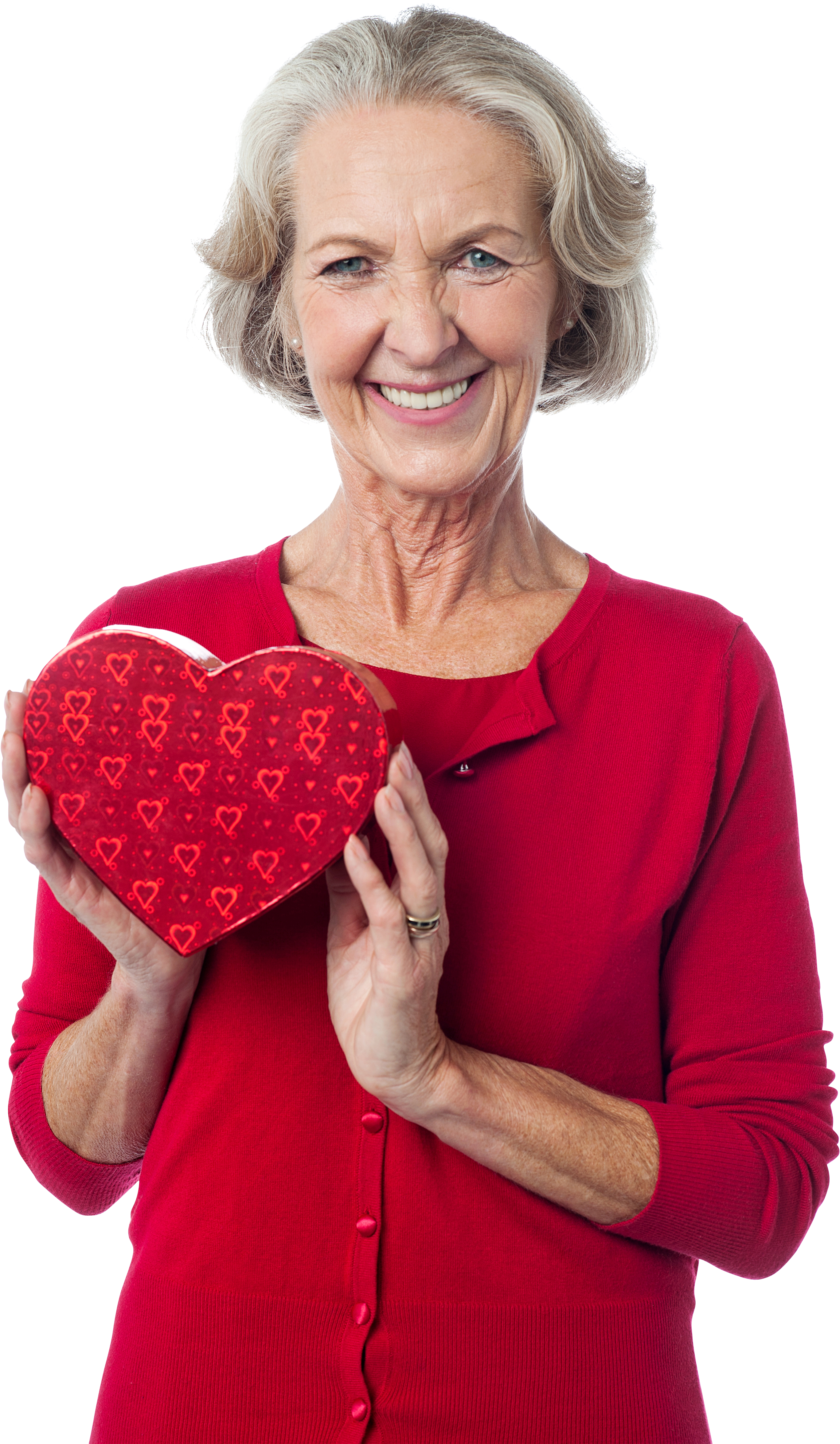 Smiling Grannywith Heart Shaped Box 壁紙 — 一位灰髮老婦人微笑著，手持一個裝飾著小愛心的紅色心形盒子。
