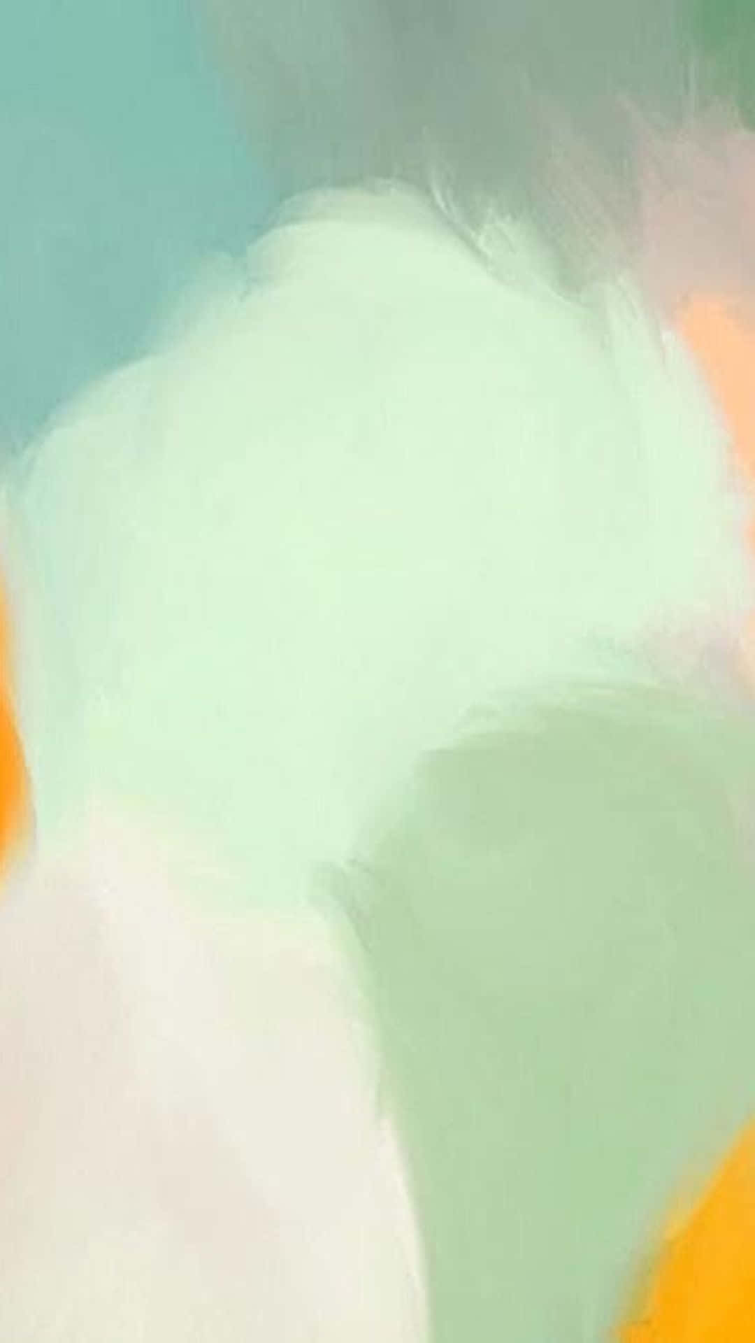 壯麗多彩雲景 壁紙 — 柔和嘅抽象筆觸將薄荷綠、蜜桃色同藍綠色融合喺夢幻嘅水彩洗滌中。