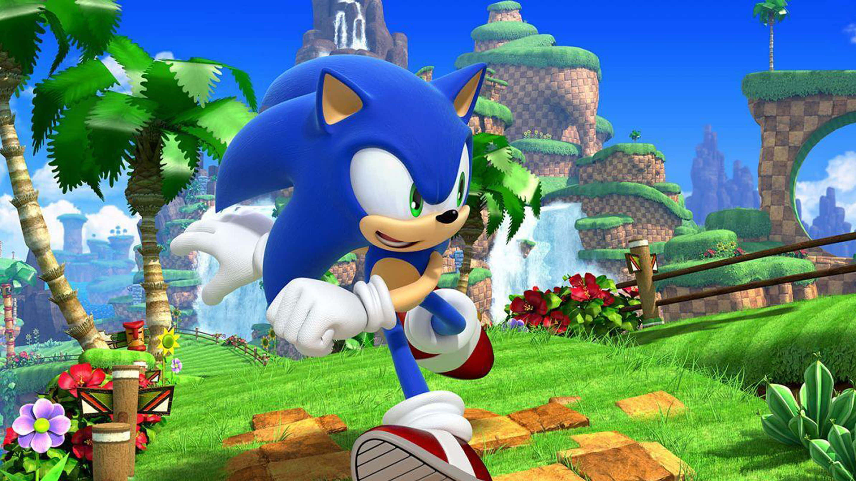 Sonic Dash 桌布 壁紙 — Sonic the Hedgehog 喺明亮藍天下，穿過充滿瀑布同色彩繽紛花朵嘅熱帶叢林風景。