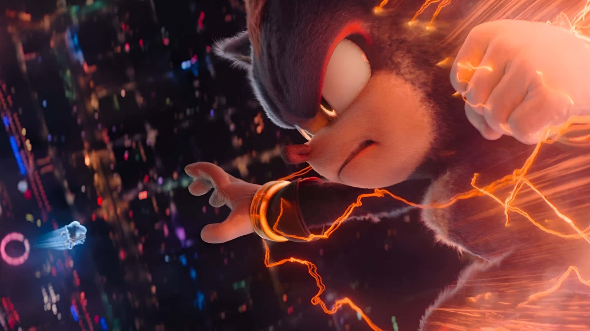  壁紙 — Sonic the Hedgehog 喺霓虹燈照亮嘅城市景觀中奔馳，拳頭同手臂周圍有橙色發光能量噼啪作響。
