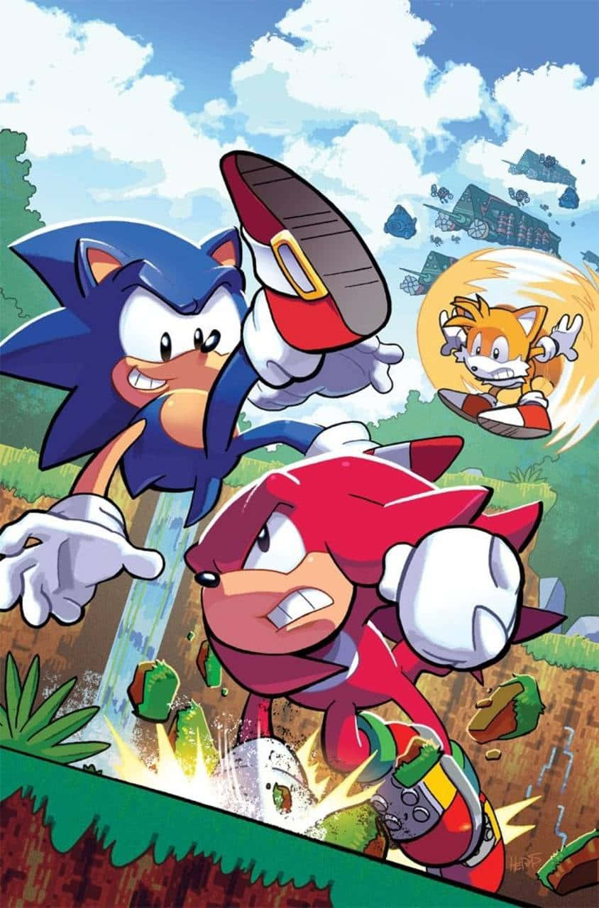 Sonic Angel Island 桌布 壁紙 — Sonic 和 Knuckles 喺充滿活力嘅綠色風景中飛馳，Tails 喺佢哋後面飛翔，呈現動感漫畫風格。