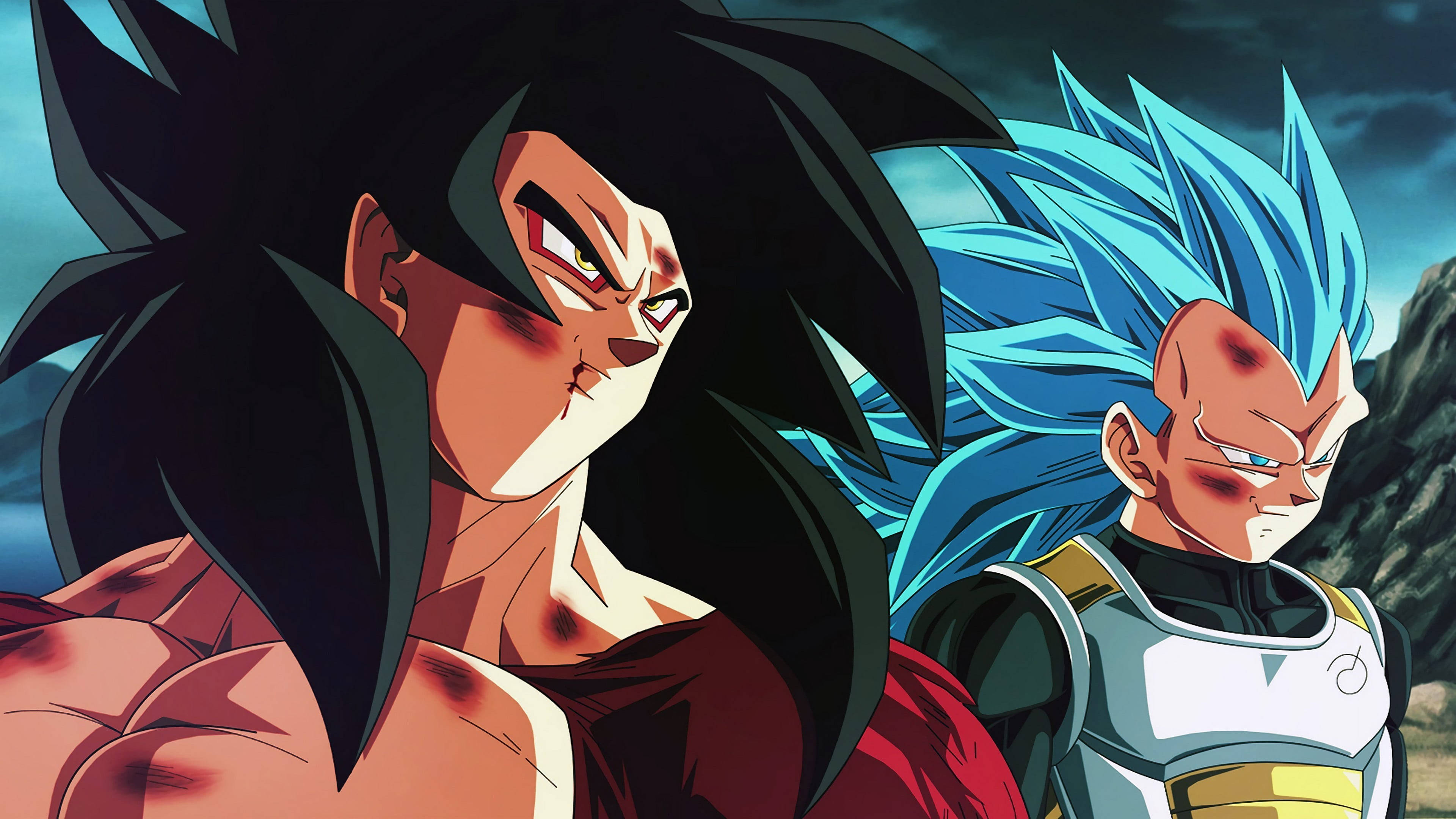 SSJ4悟空與藍髮貝吉塔 壁紙 — 兩個動漫戰士，一個黑髮一個藍髮，站在岩石景觀中，天空風暴來襲。