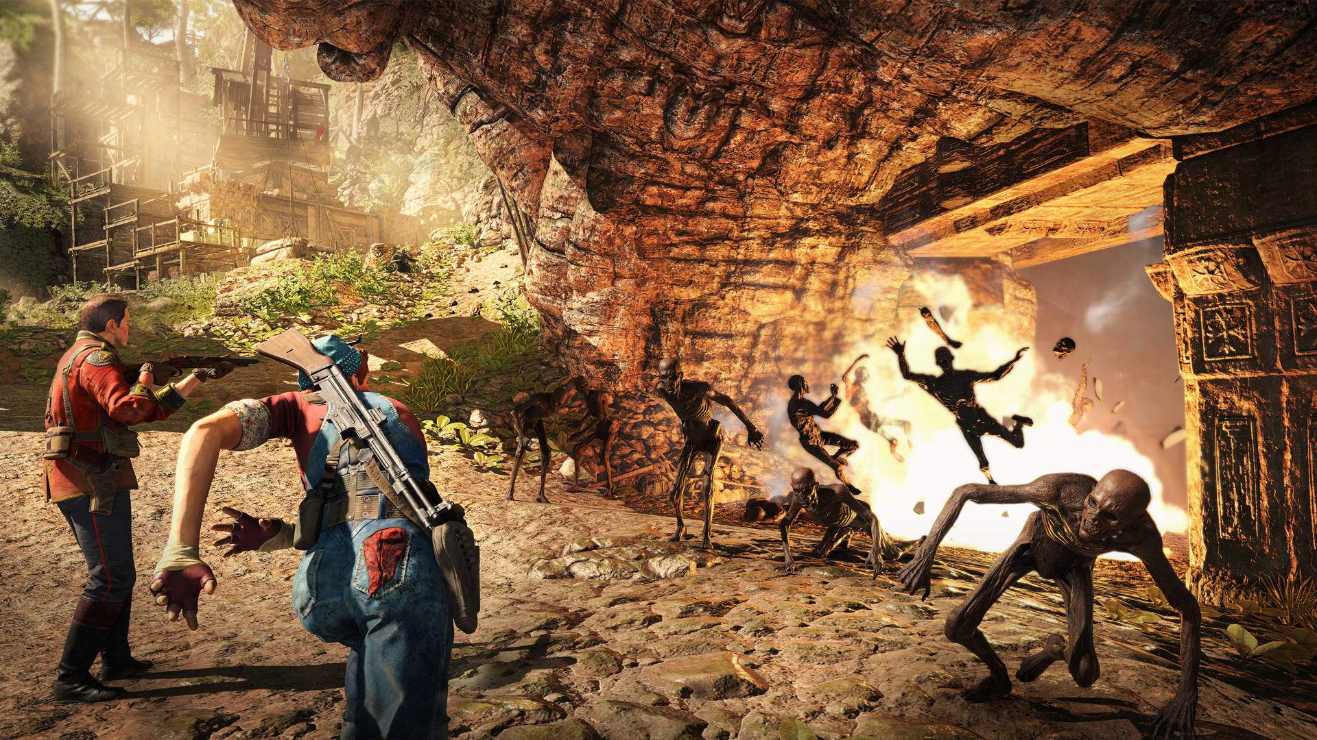 《Strange Brigade》轟炸殭屍 壁紙 — 兩名倖存者在一個陽光普照的洞穴中與怪誕的殭屍般生物戰鬥，洞穴內有古代遺跡和熾熱的爆炸。