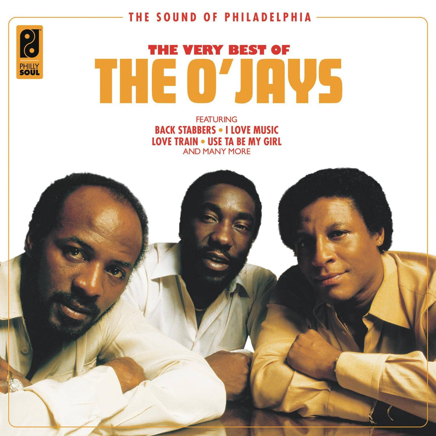 Sunshine MP3 歌曲下載 Ojays 壁紙 — The O'Jays 的三位成員自信地穿著淺色襯衫，在純白背景前擺姿勢，帶有醒目的橙色和紅色專輯文字。