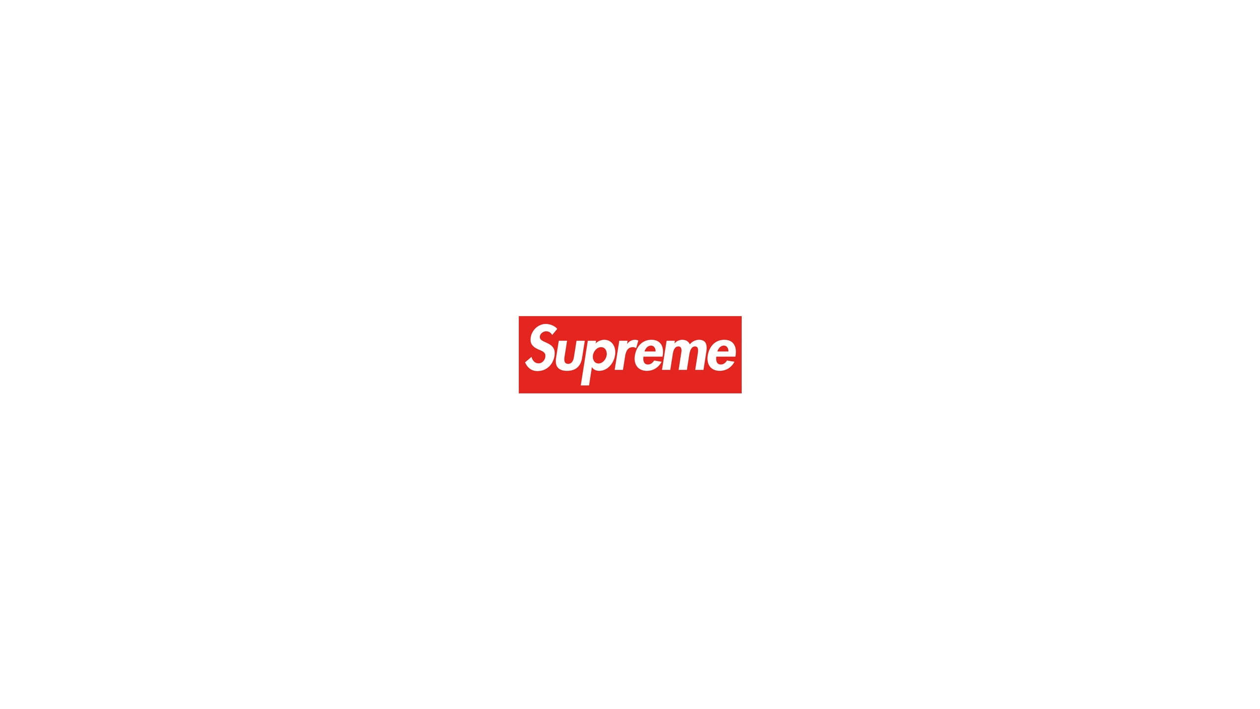 極簡主義 Supreme 筆記本電腦壁紙 壁紙 — 一個極簡的紅色Supreme標誌，居中放置在純白背景上。