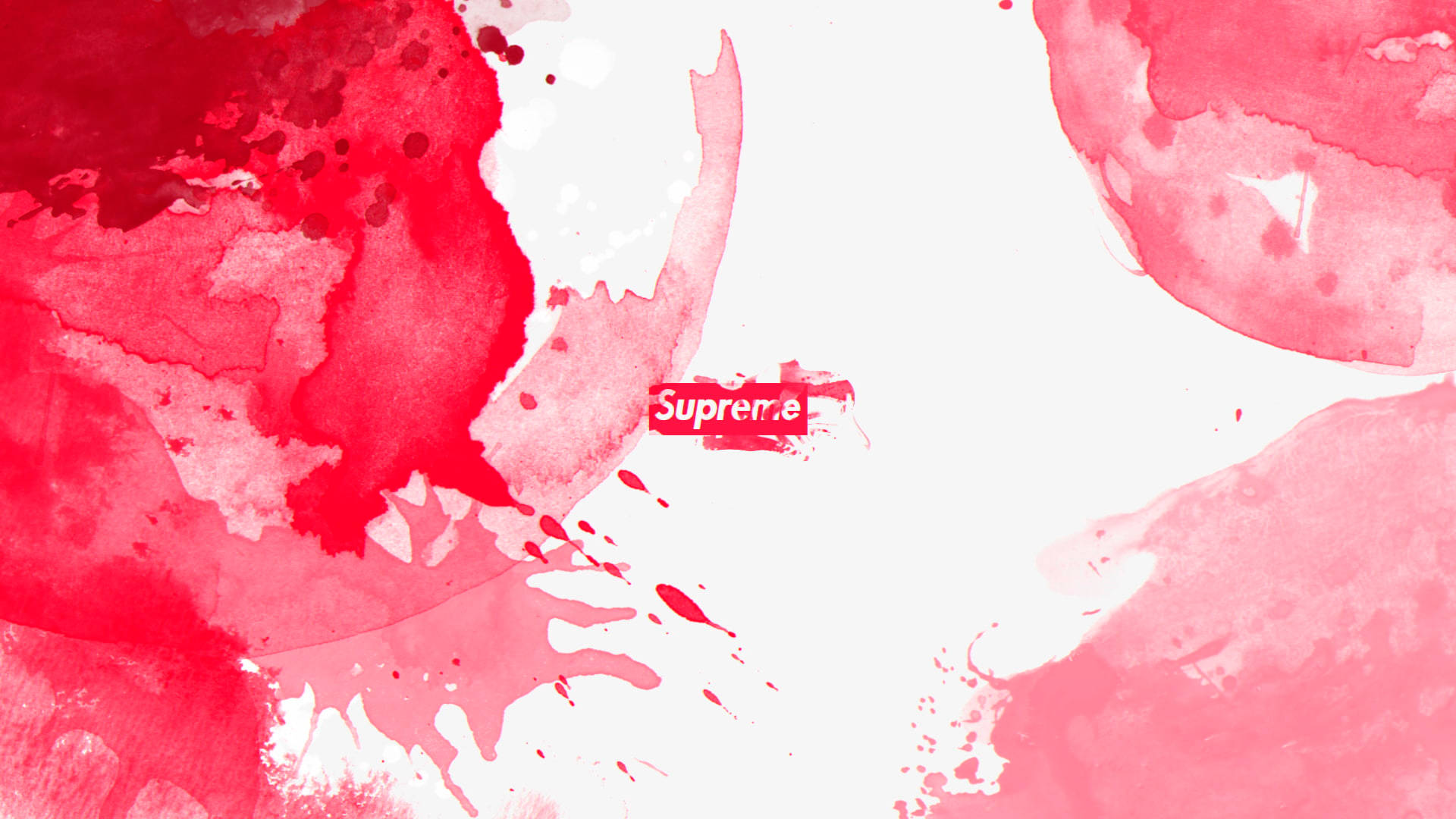 Supreme粉紅紅色塗鴉桌面壁紙 壁紙 — 鮮豔的紅色水彩潑濺在潔淨的白色背景上形成對比，中央有一個細小的Supreme標誌。