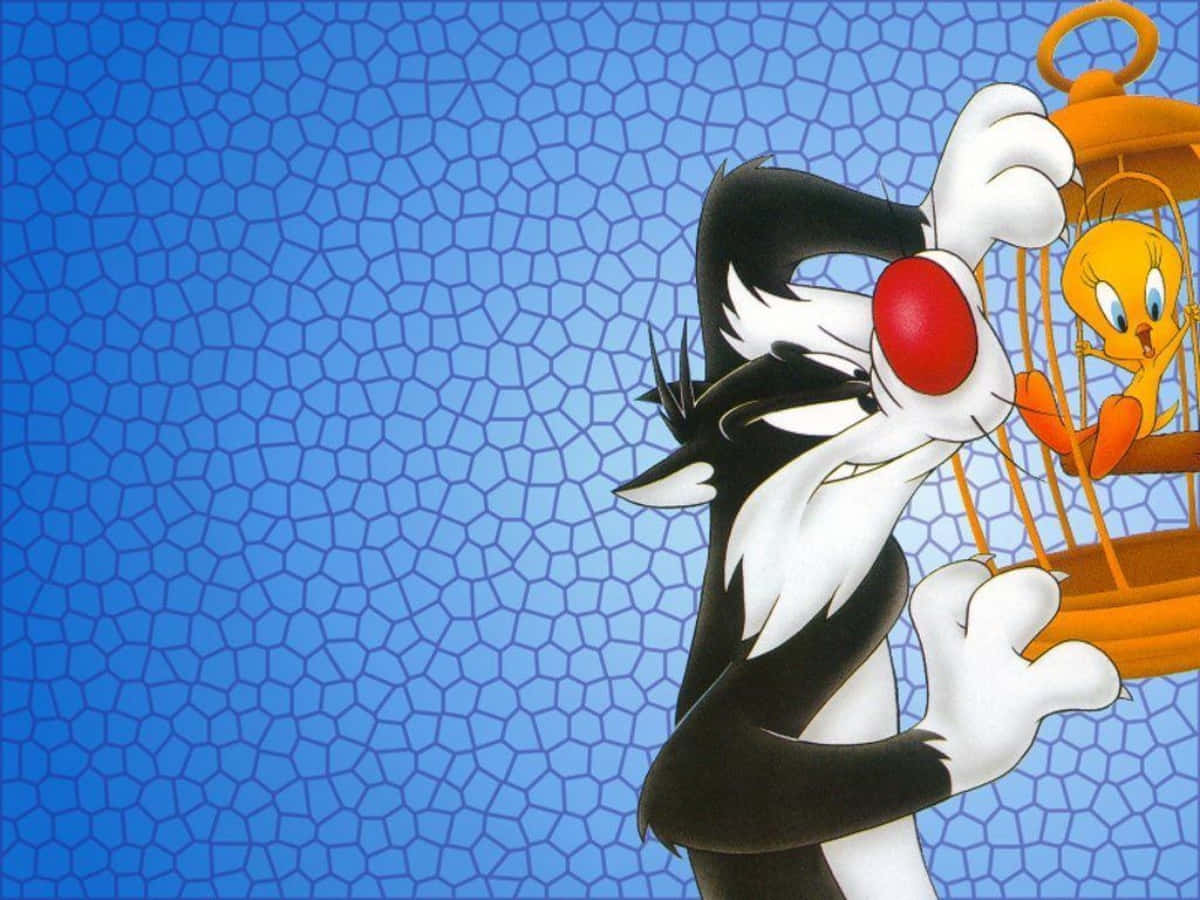 Sylvester The Cat 發夢中 壁紙 — 貓咪 Sylvester 拿著一個鳥籠，裡面有 Tweety Bird，背景是藍色六邊形圖案。