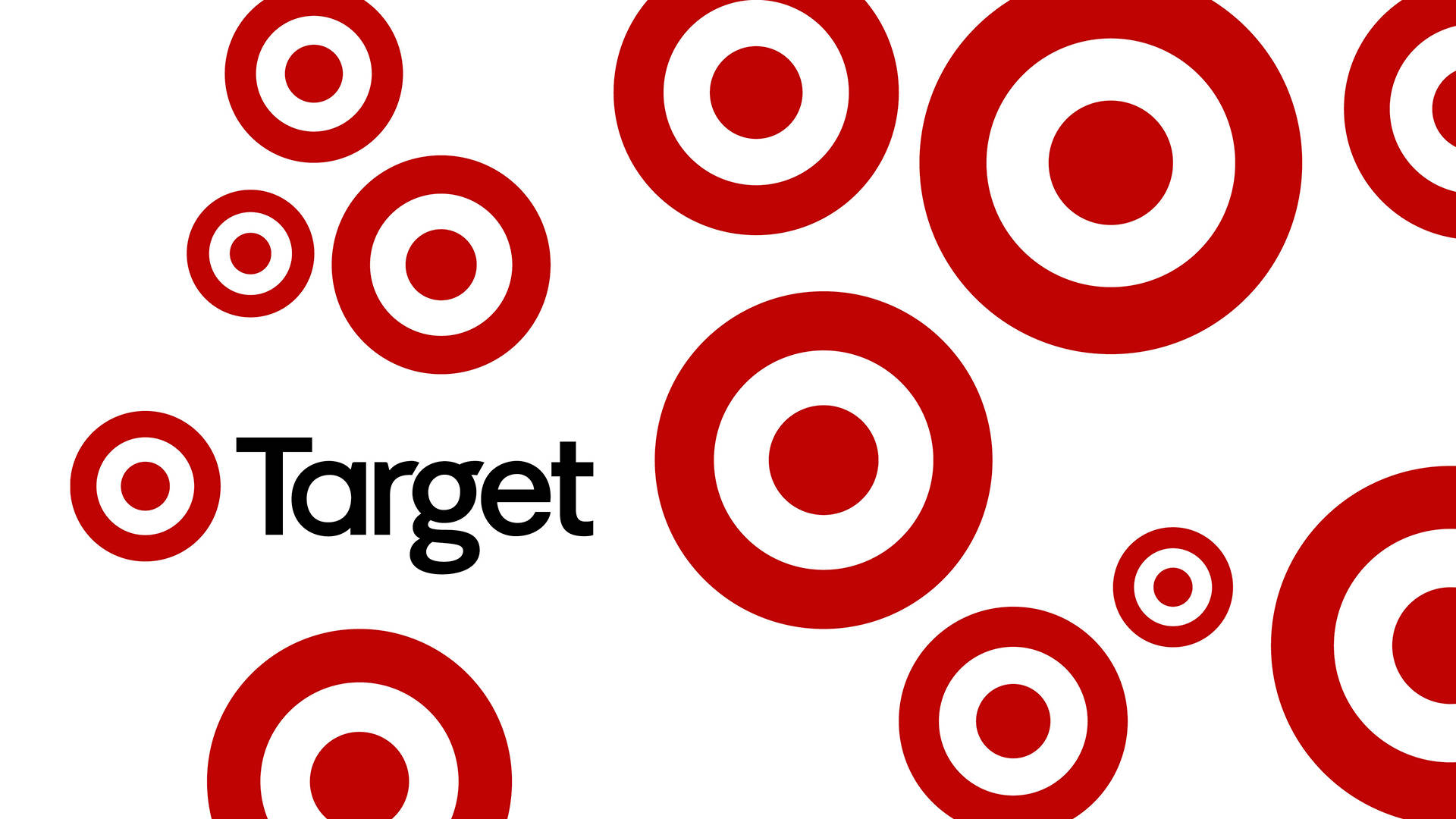 Target 零售品牌海報 壁紙 — 紅色靶心標誌漂浮在乾淨的白色背景上，並以粗體黑色文字顯示「Target」一詞。