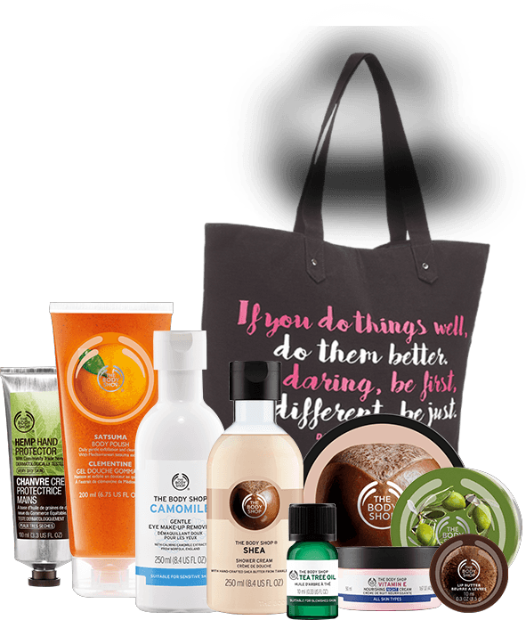 The Body Shop 美妝保養產品系列 壁紙 — 一系列The Body Shop護膚產品，搭配一個印有勵志文字的黑色手提袋。