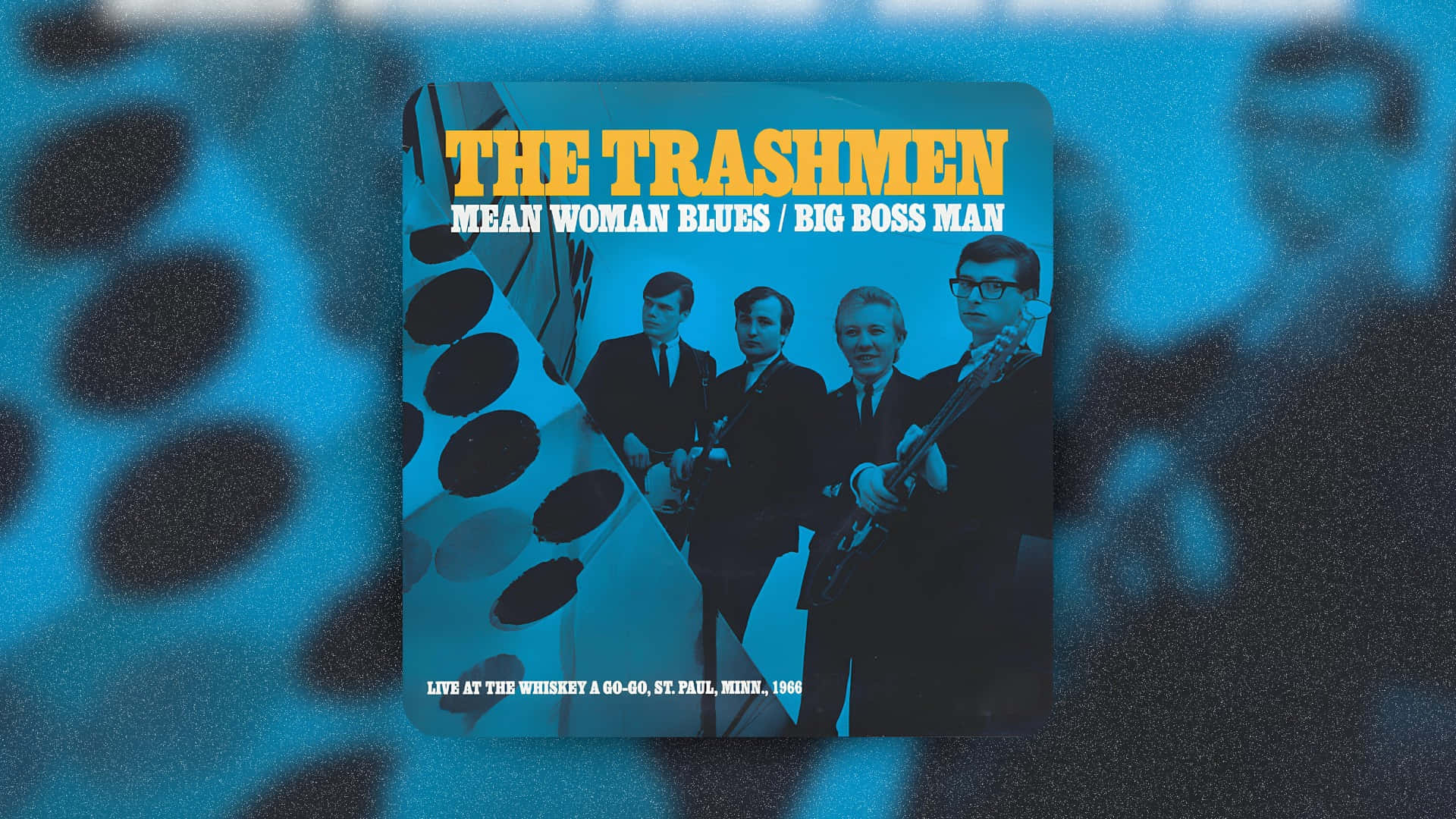  壁紙 — The Trashmen 的復古藍調專輯封面，帶有粗體黃色文字和模糊背景斑點。
