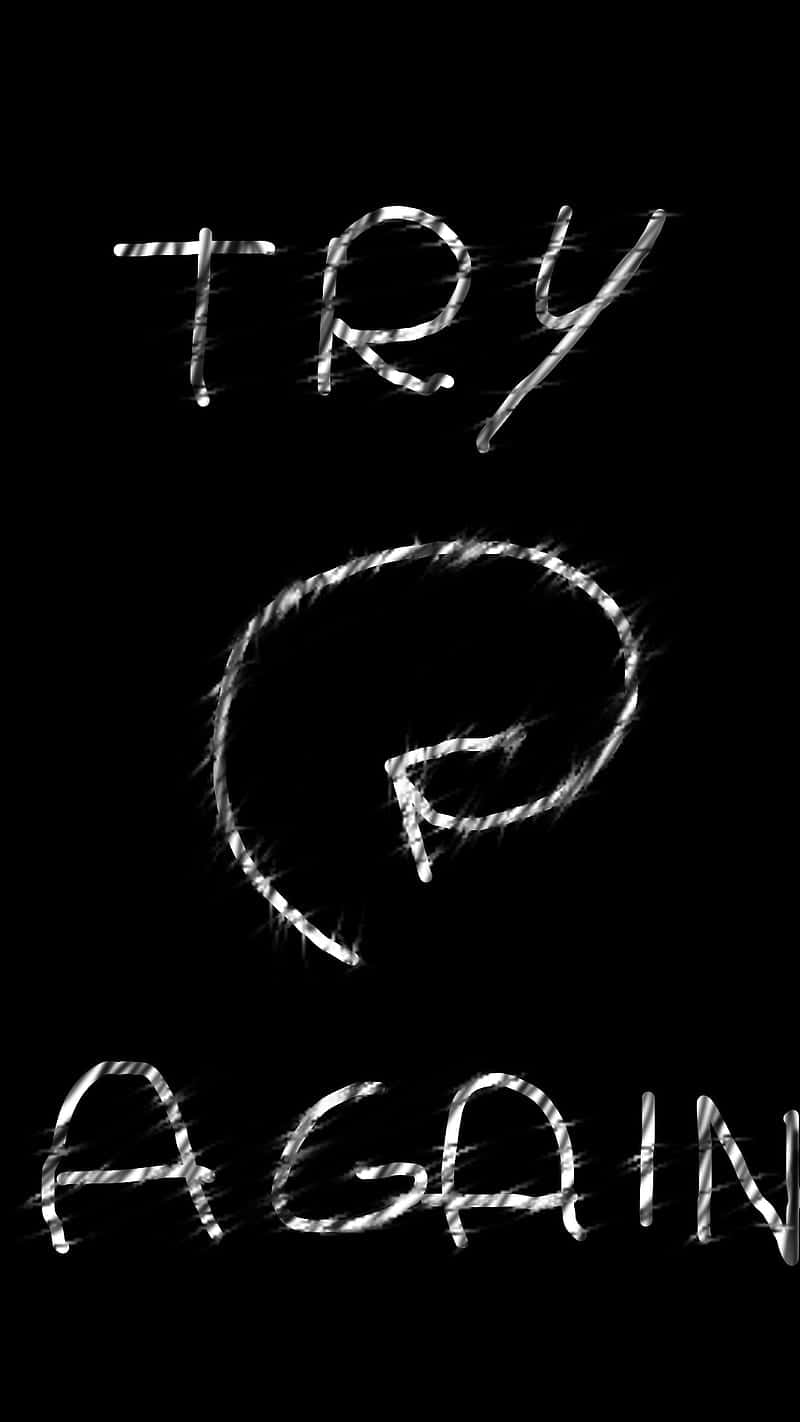  壁紙 — 「TRY AGAIN」呢幾個字以鋸齒狀嘅白色條紋喺純黑色背景上發光。
