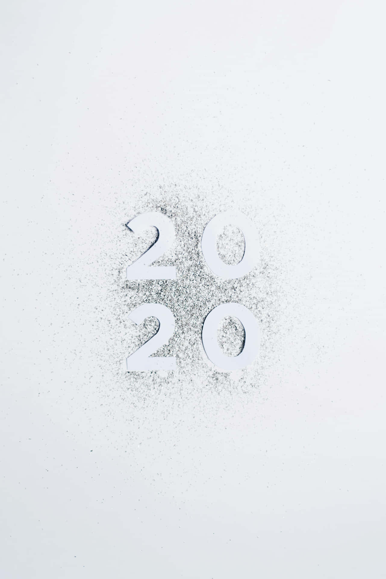  壁紙 — 2020年由閃爍粒子形成，逐漸融入柔和的白色背景。