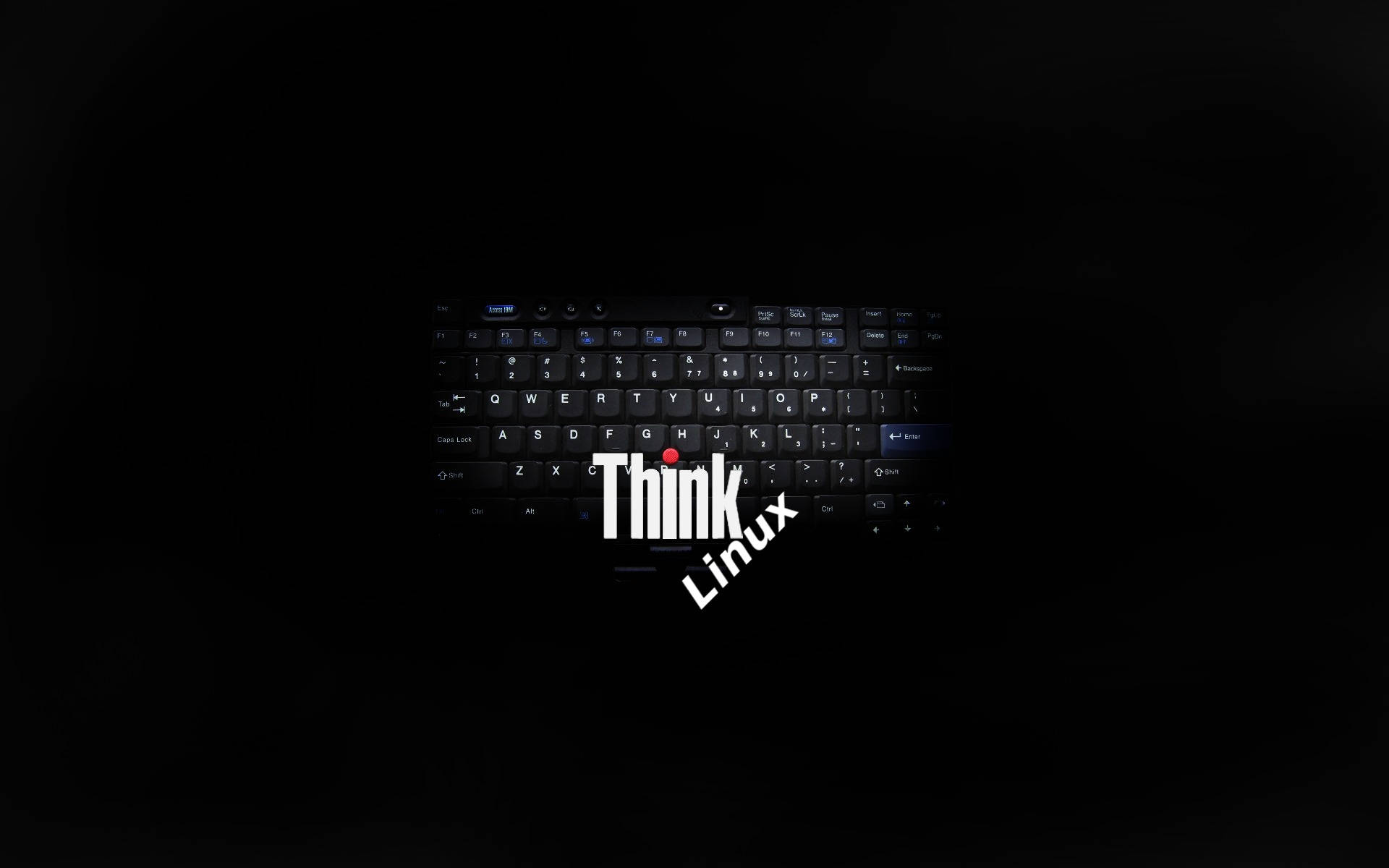 黑色手提電腦鍵盤，帶有發光白色Think Linux標誌及紅點。