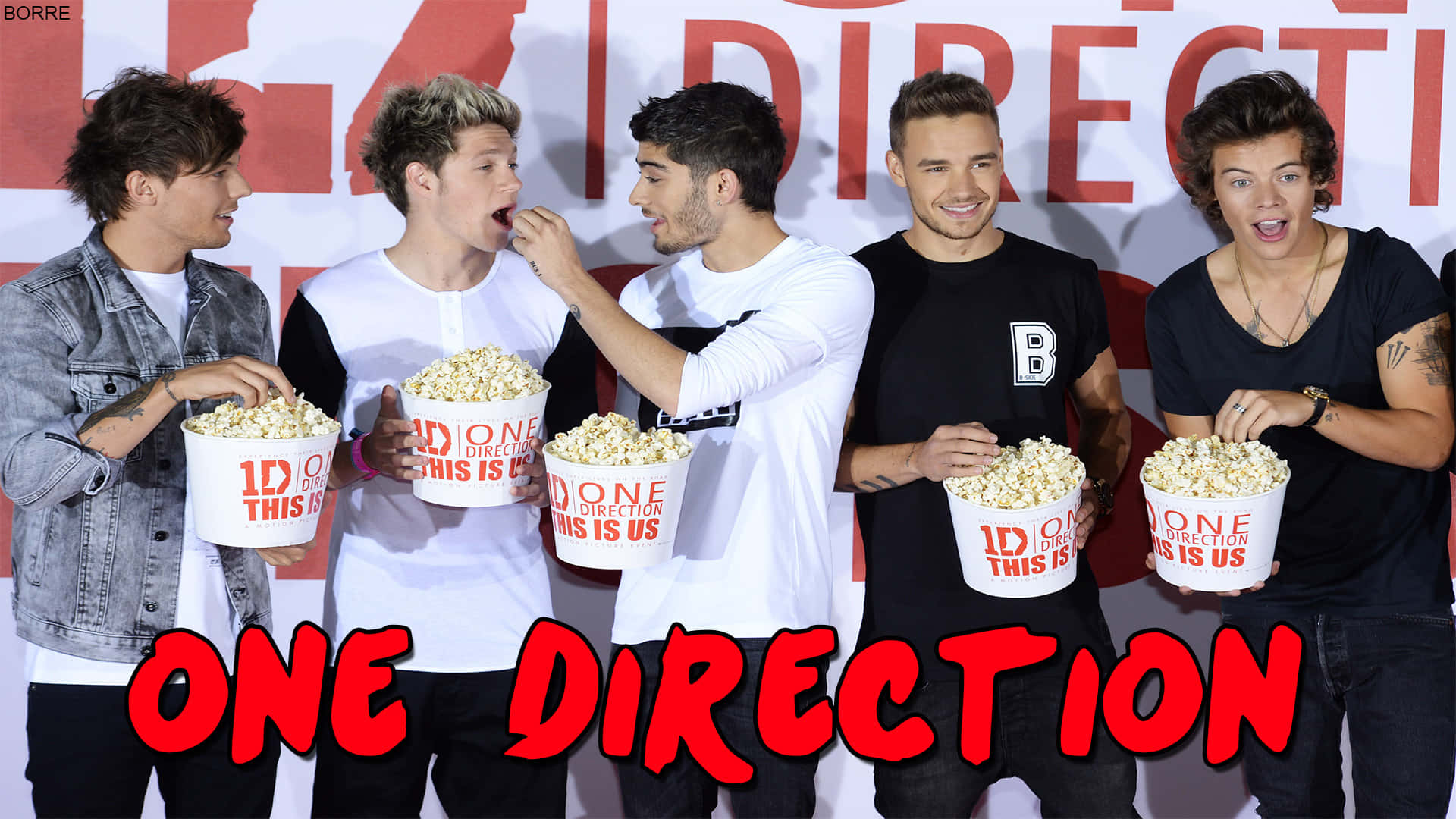 One Direction 樂隊成員手持爆谷桶一起大笑。
