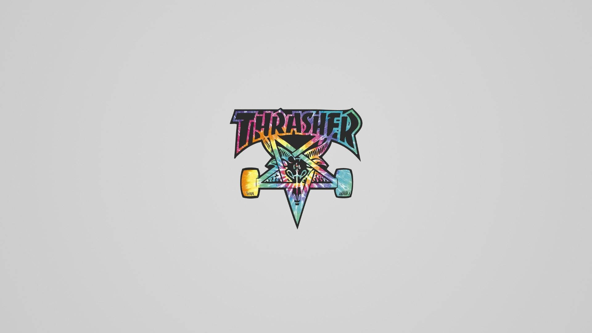 Thrasher雜誌標誌，以彩虹色呈現滑板與骷髏圖案。