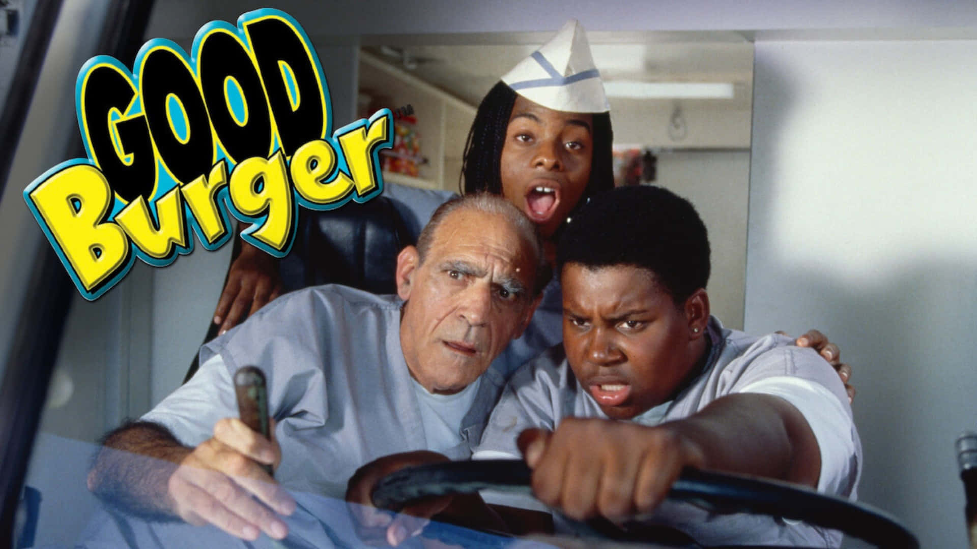  壁紙 — 三位演員在車內表情誇張，角落有「Good Burger」標誌。