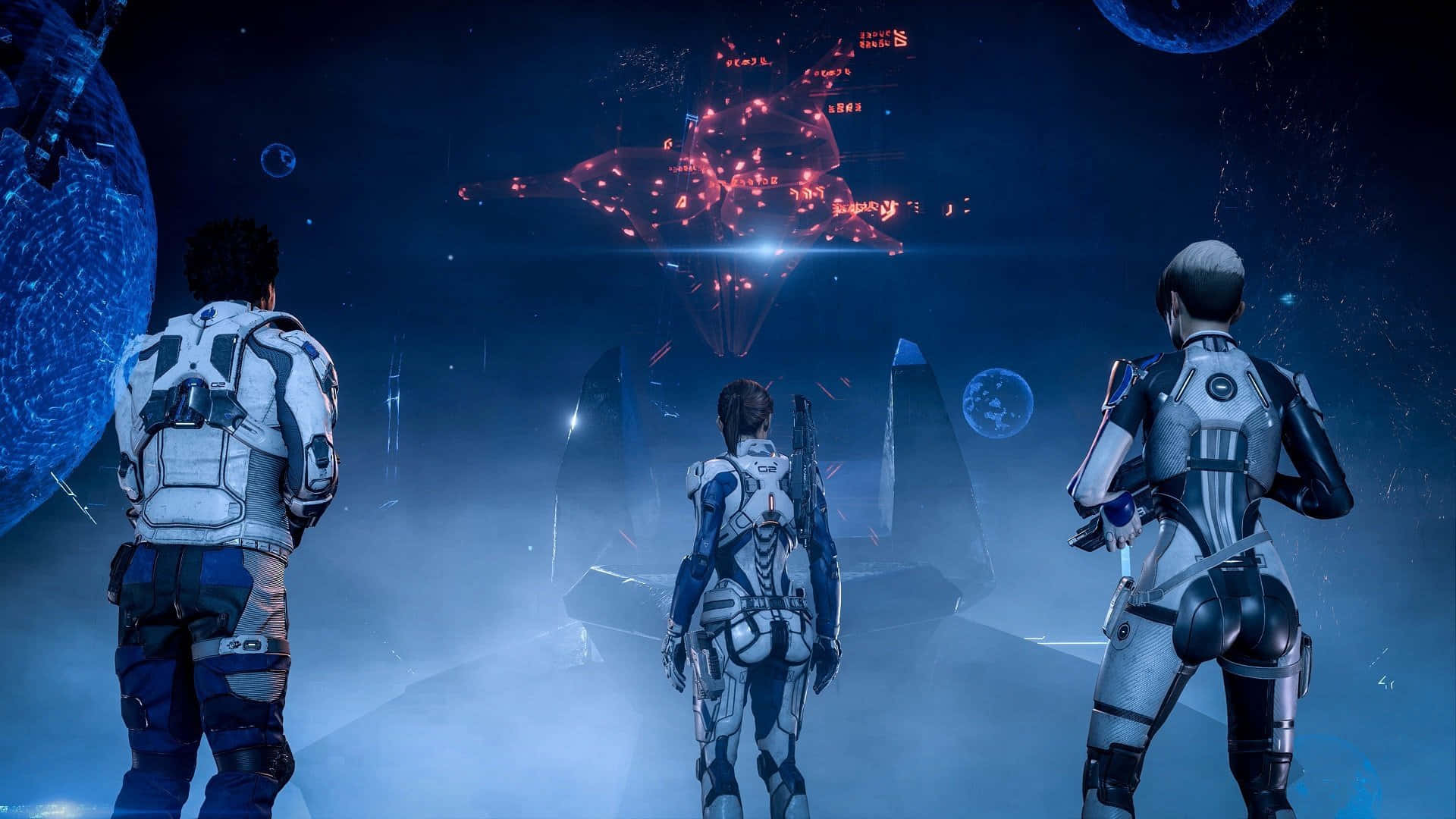 Mass Effect Andromeda 桌布 壁紙 — 三名身穿未來風格太空衣的太空人，凝視著一個漂浮在星際宇宙虛空中的發光紅色外星結構，附近還有行星。
