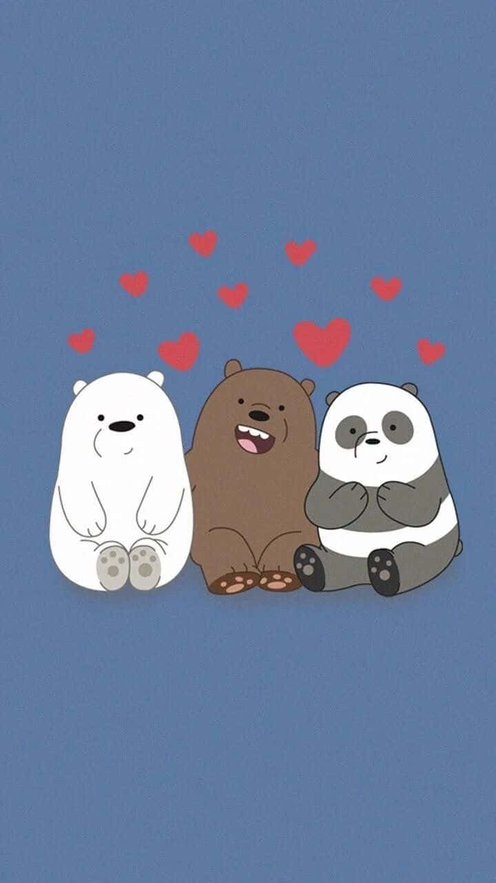  壁紙 — 三隻卡通熊坐在藍色背景上，上方漂浮著紅色愛心。