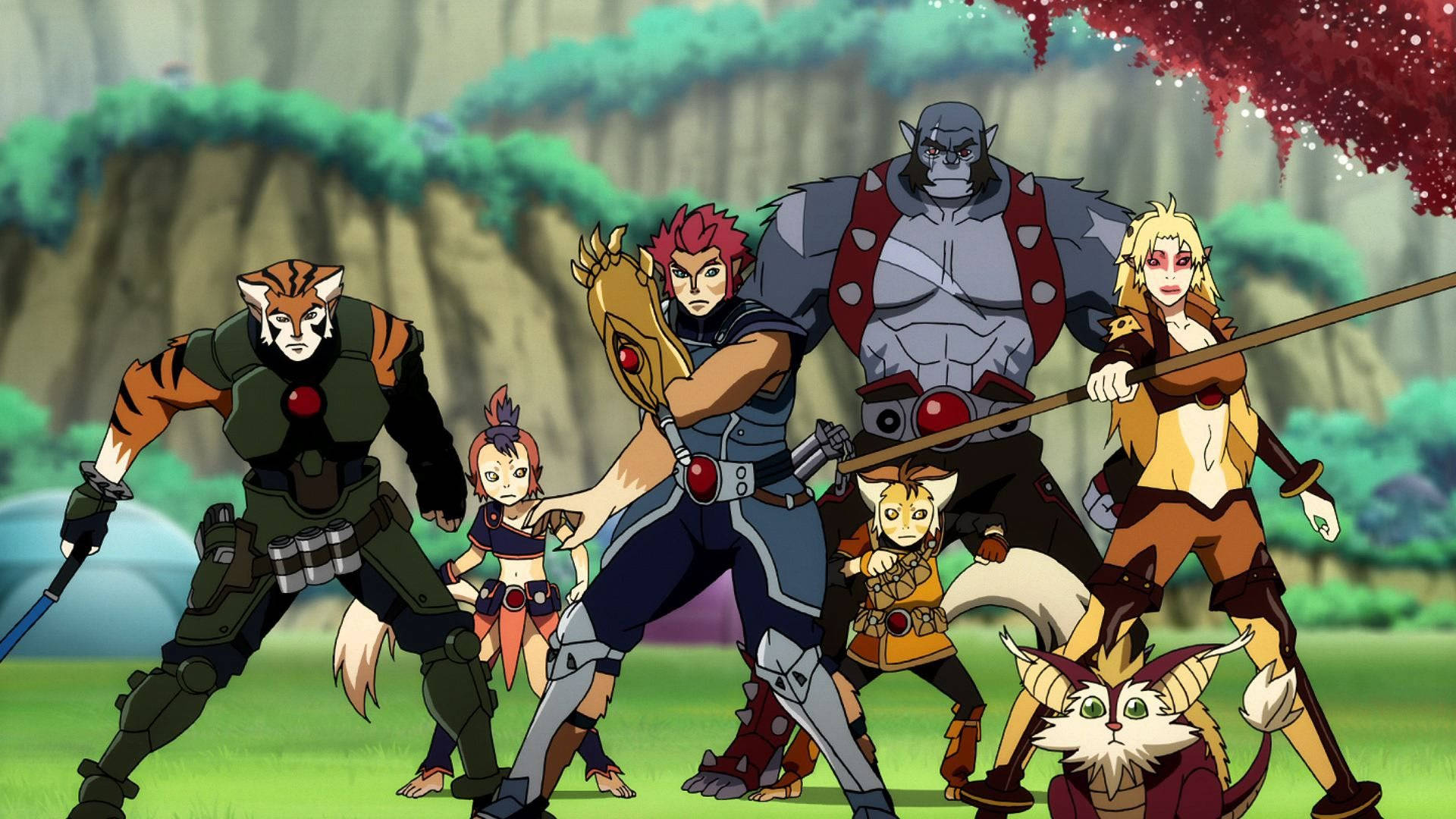 Thundercats 動畫系列經典場景 壁紙 — 一群風格化的動物特徵動漫角色在翠綠的山谷中準備戰鬥。
