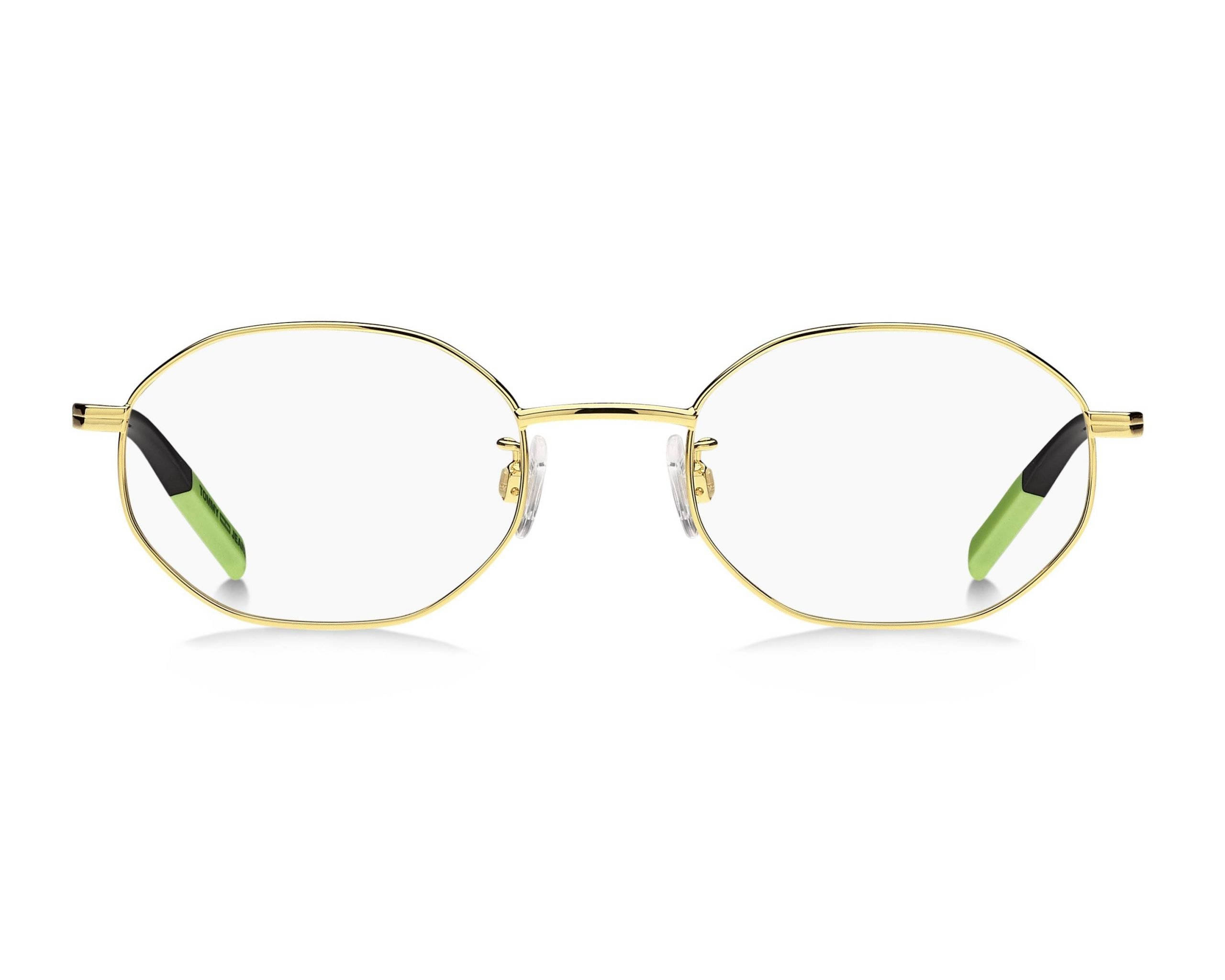 Tommy Hilfiger TJ-0022 001 50mm 清透眼鏡 壁紙 — 優雅的金邊眼鏡，配有青檸綠色鏡腿尖端，在潔白背景上展示。