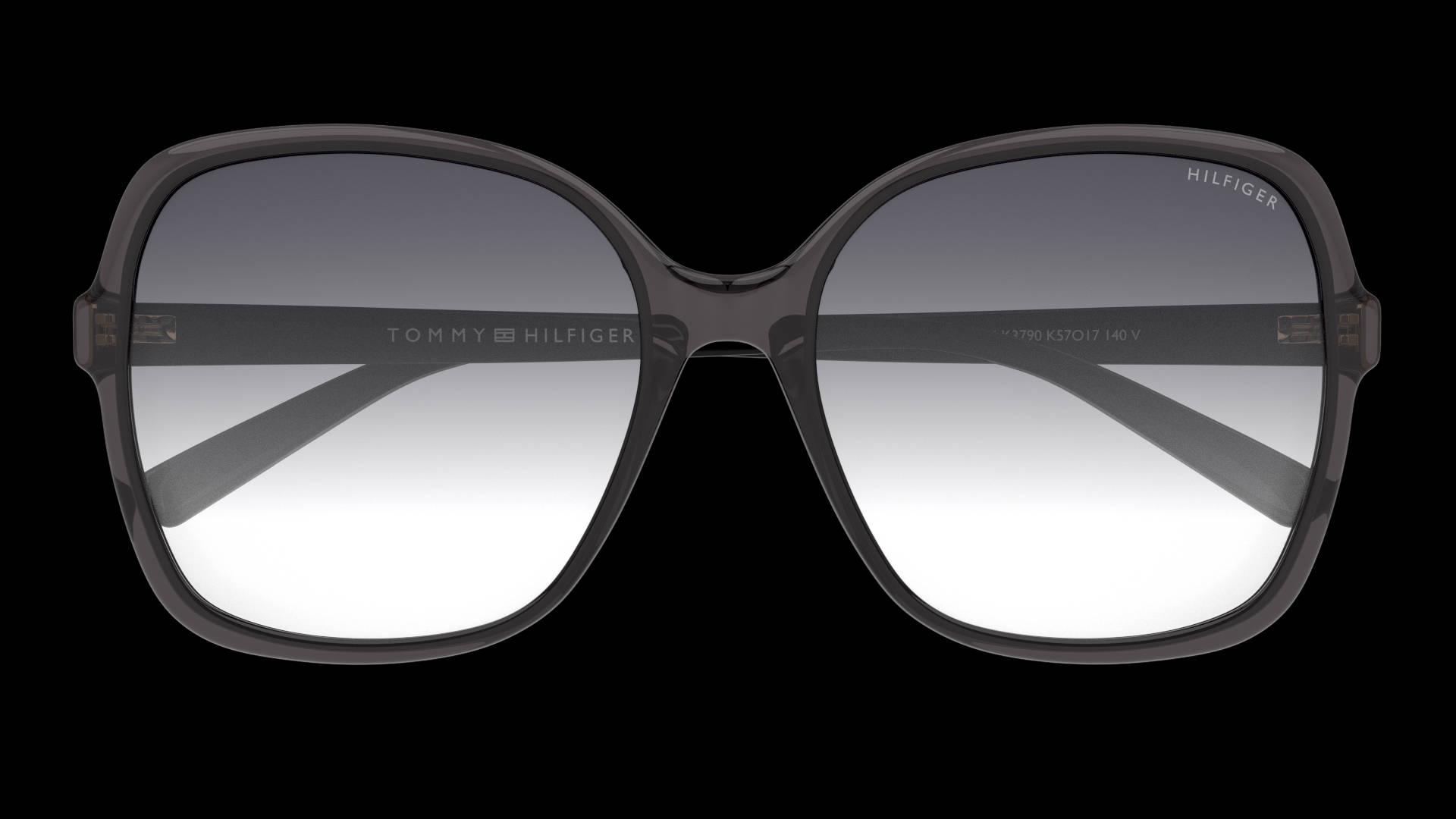 Tommy Hilfiger TH 1857/RE/S 女士生物基材太陽眼鏡 壁紙 — 大膽的方形框 Tommy Hilfiger 太陽眼鏡，配備漸變灰色鏡片，襯托純黑背景。