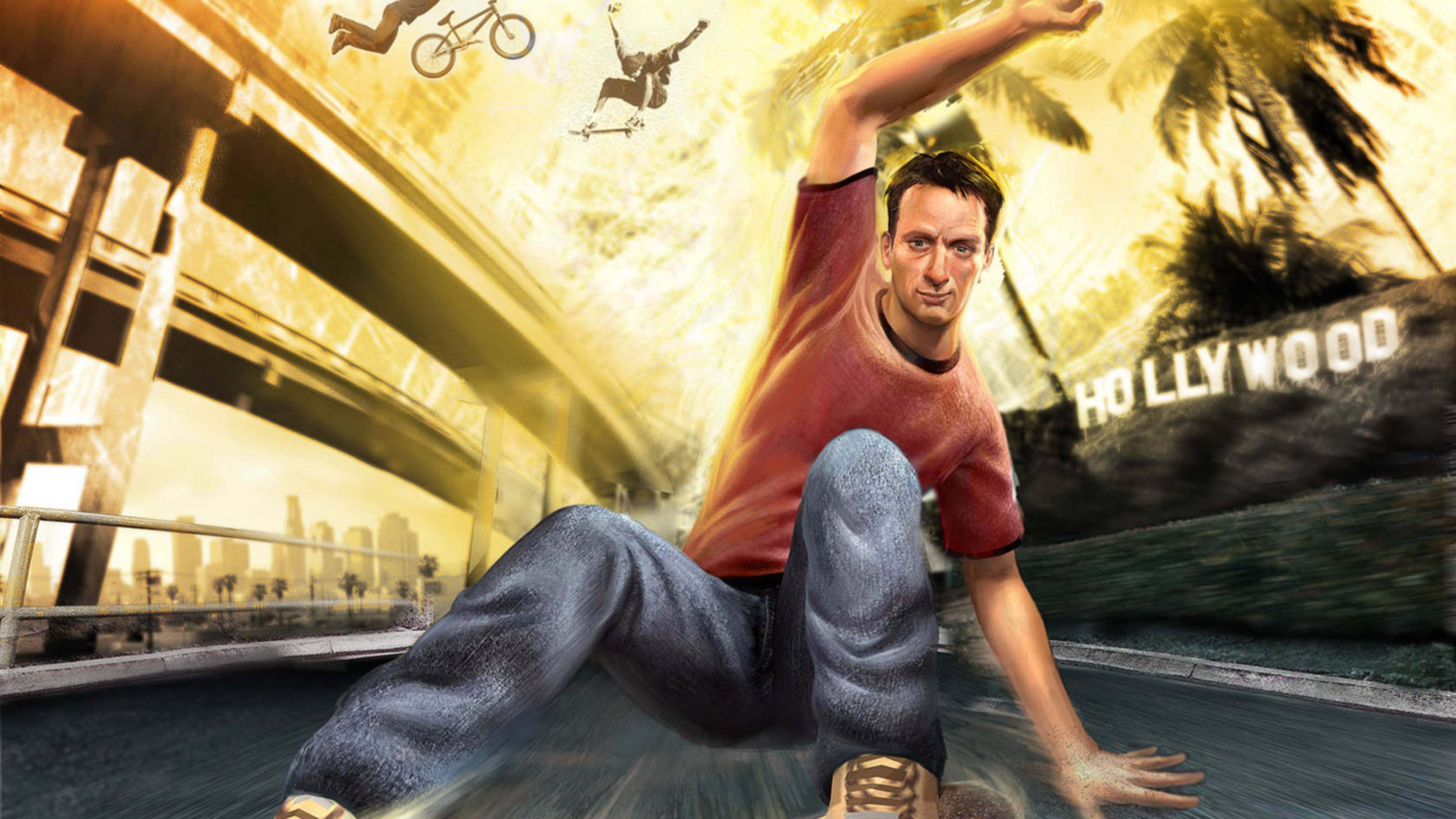 《Tony Hawk's American Wasteland》好萊塢街頭 壁紙 — 一名男子在荷里活的街道上玩滑板，上空有電單車手和滑板手飛過。