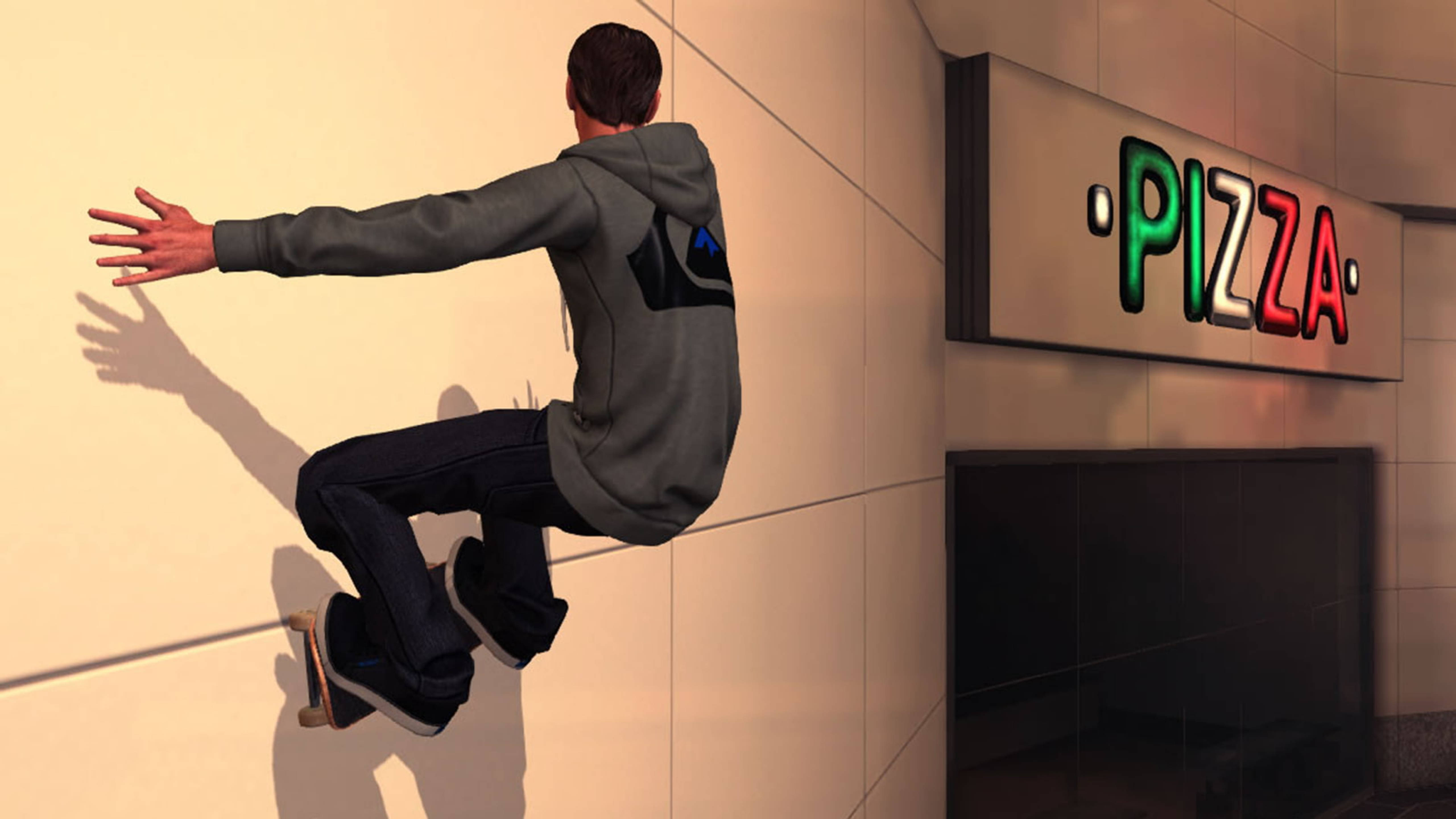 《Tony Hawk's Pro Skater》披薩牆 壁紙 — 一名身穿灰色連帽衫的男子在明亮的薄餅店招牌旁邊攀爬米色瓷磚牆。
