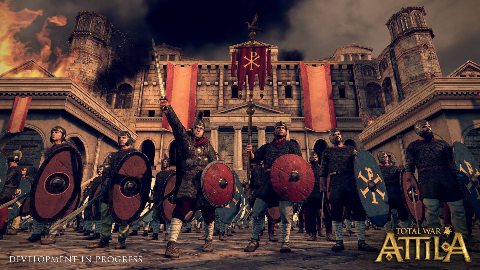 Total War: Attila 城堡守衛 壁紙 — 身穿盔甲的羅馬軍團士兵手持盾牌和劍，在黑暗的天空下，在燃燒的古老寺廟前前進。