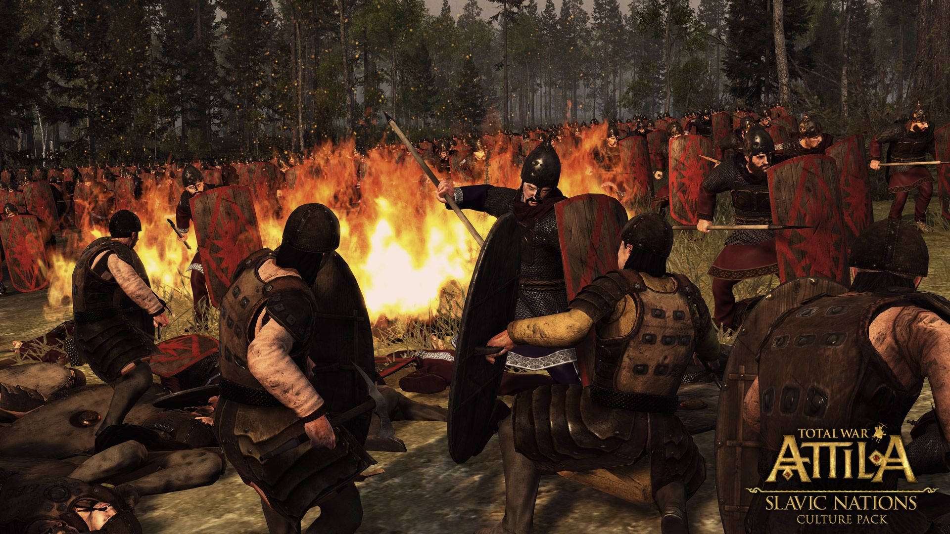 Total War Attila 士兵防守 壁紙 — 身穿暗色盔甲的戰士在茂密森林戰場的咆哮火焰中交鋒。