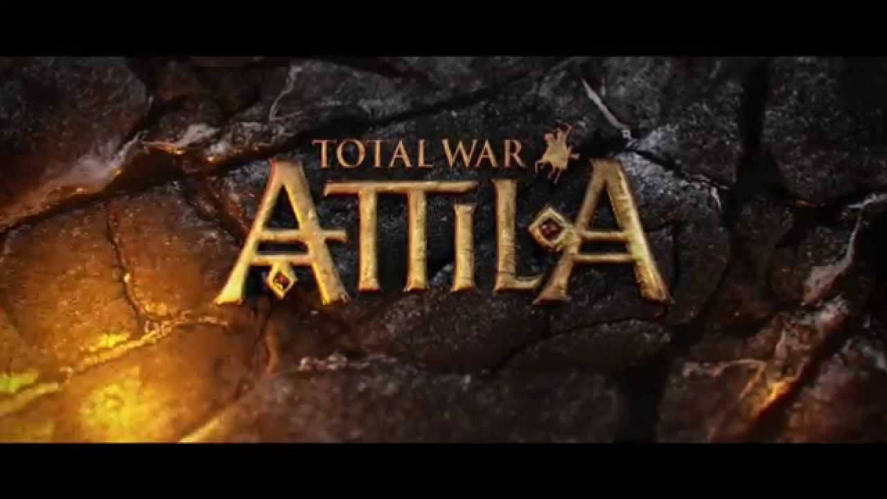 Total War Attila 金屬字樣 壁紙 — 金色嘅 'Total War ATTILA' 標誌嵌入裂開嘅深色石頭，帶有發光琥珀色亮點。