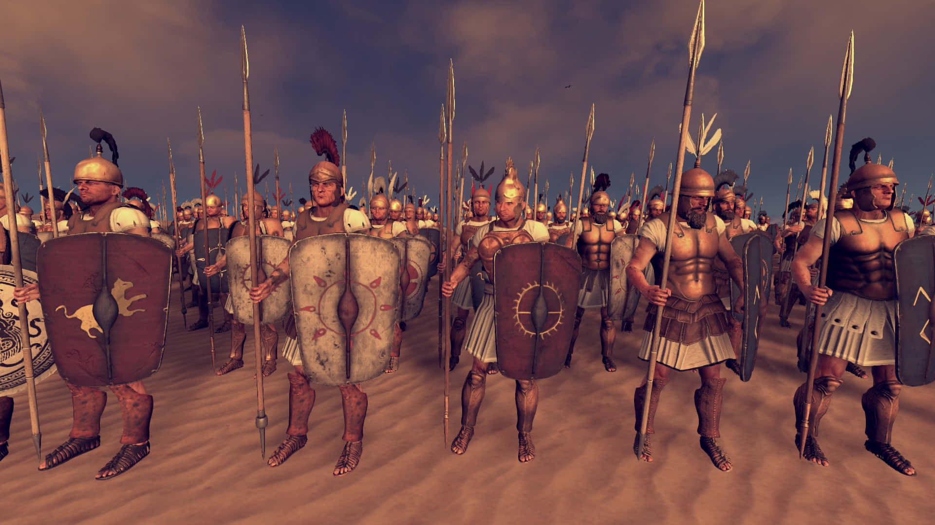《Total War: Rome 2》中爭奪羅馬帝國的激烈戰鬥 壁紙 — 古羅馬軍團士兵全副武裝，在陰天之下列隊行進於塵土飛揚的戰場。