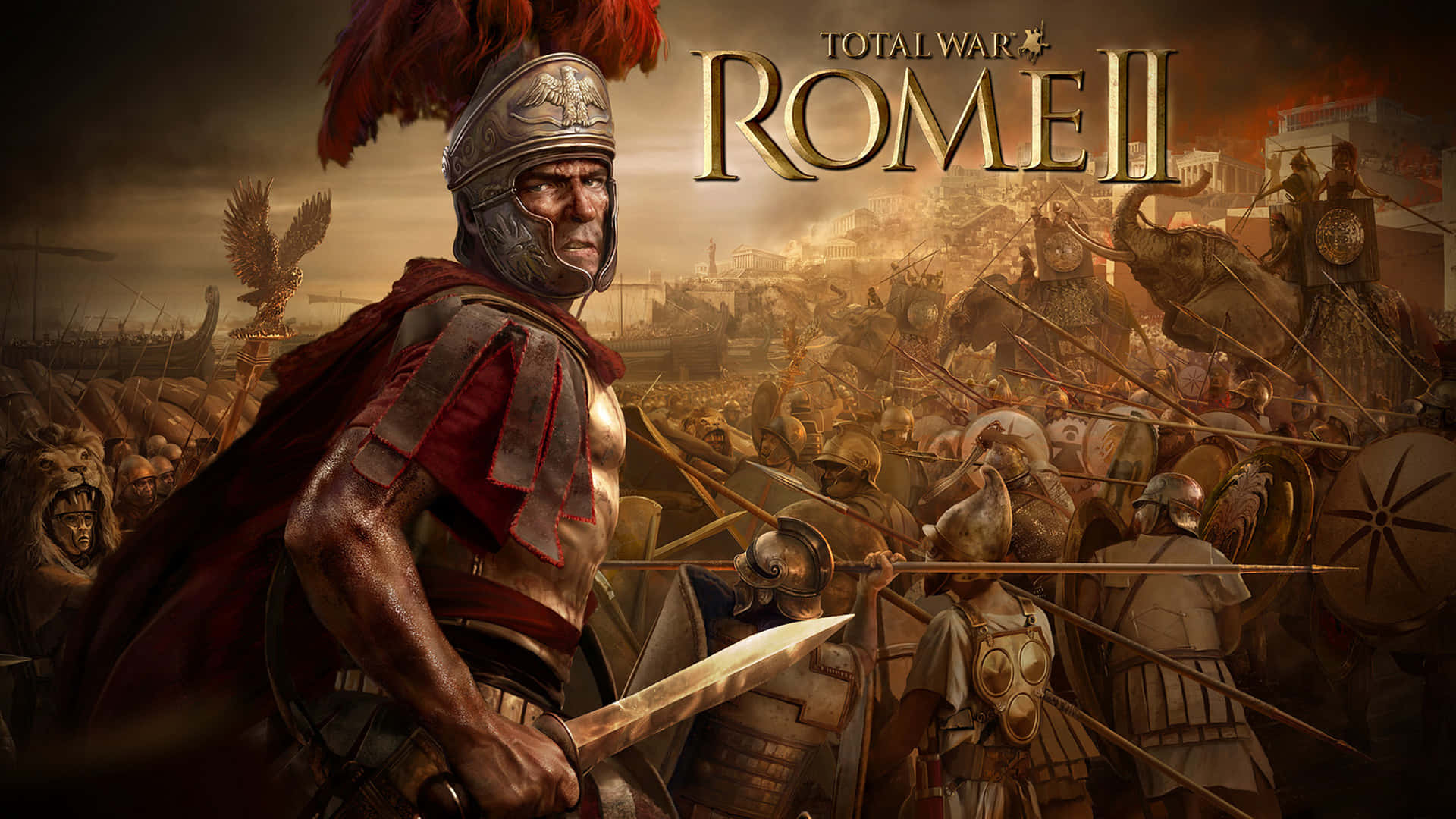 《Total War Rome 2》：主宰古代世界 壁紙 — 一名身穿精細盔甲的羅馬軍團士兵，在煙霧瀰漫的天空下，站在大象與士兵激烈交戰的混亂戰場最前線，表現出挑釁的姿態。