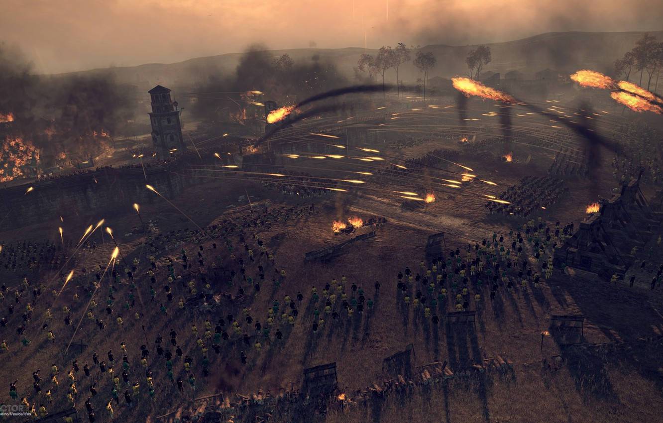 Total War 熱血攻城戰 壁紙 — 一場大規模的中世紀戰役正在激烈進行，箭如雨下，火焰在設防的田野上燃燒，士兵們列陣作戰。